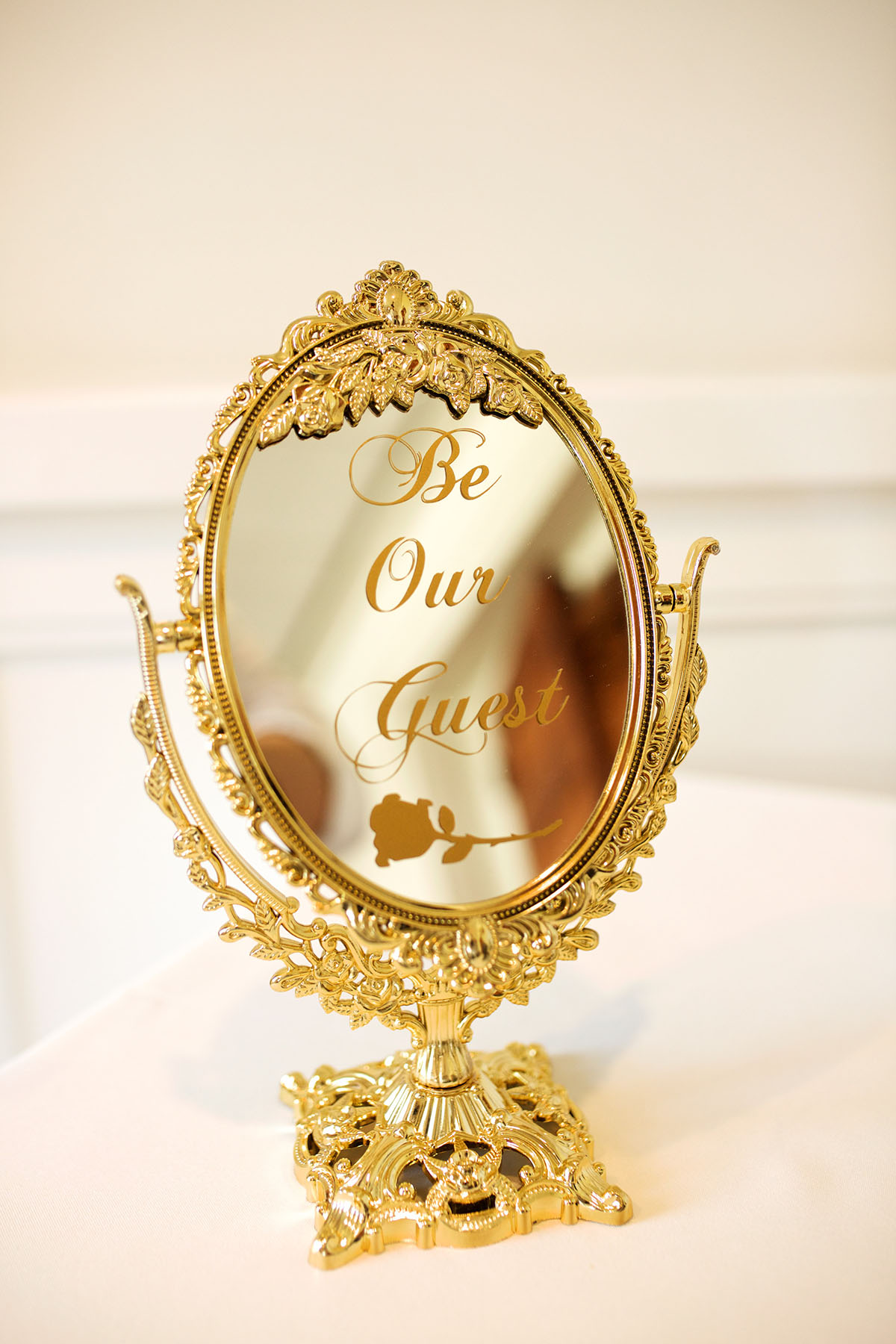 You'll want to a be a guest at this couple's Beauty and the Beast inspired wedding be our guest mirror