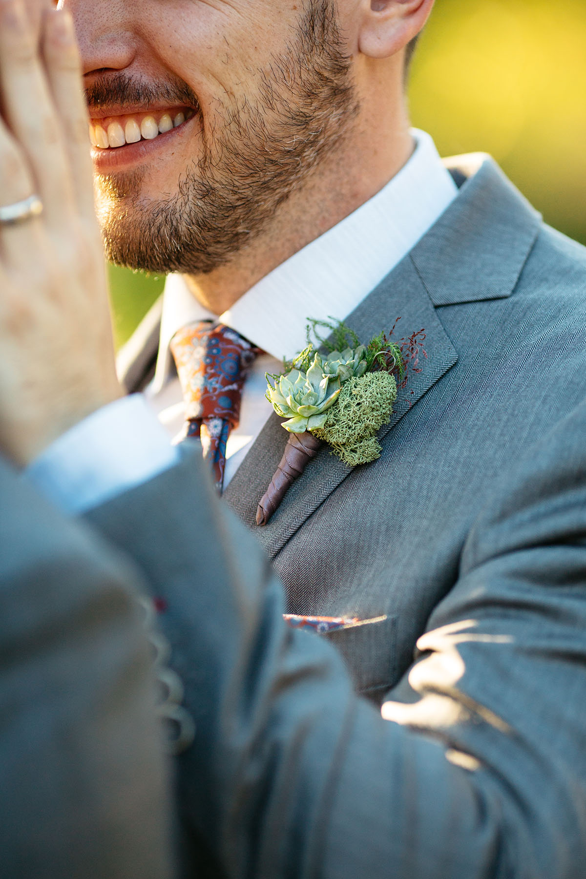 Fall mountain wedding in Aspen, Colorado two grooms steel grey tuxedos patterned ties