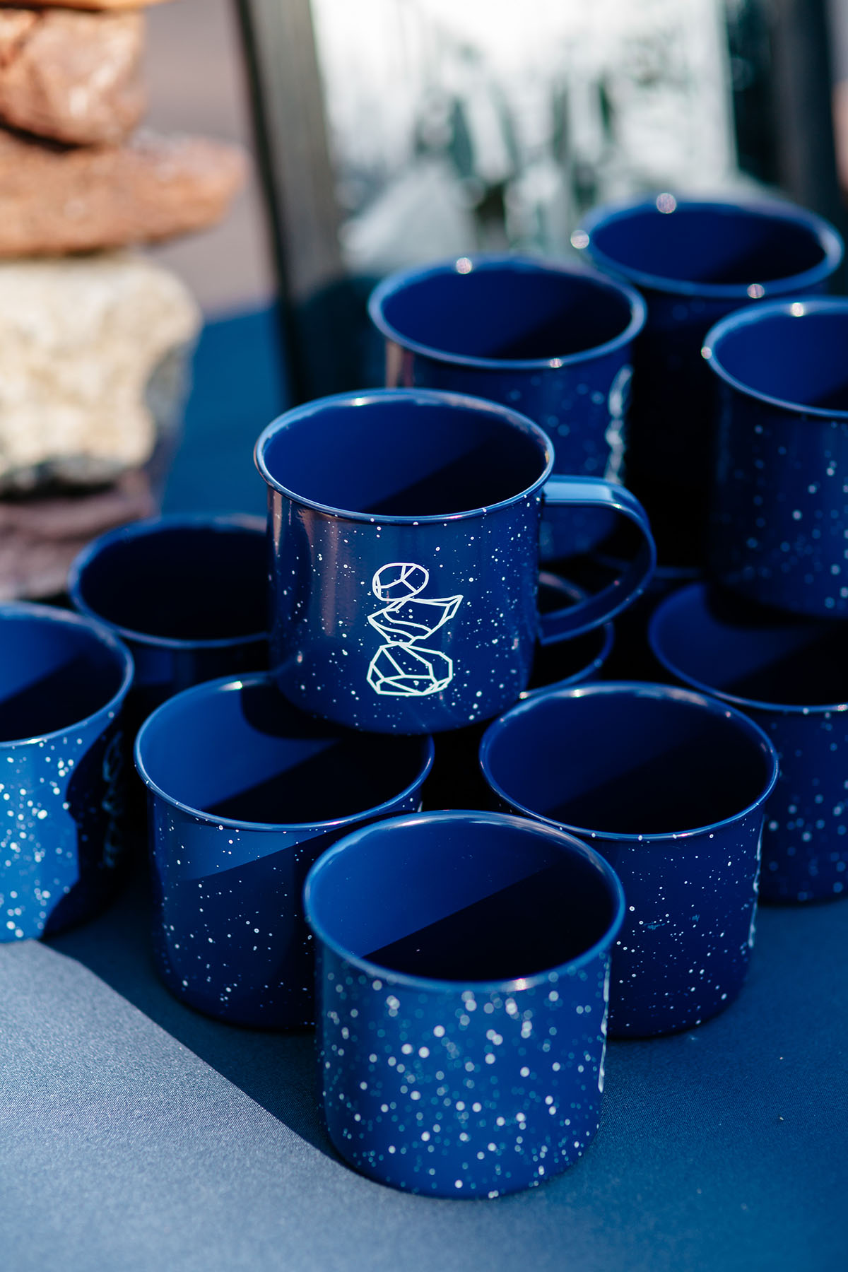 Fall mountain wedding in Aspen, Colorado cairn logo mugs