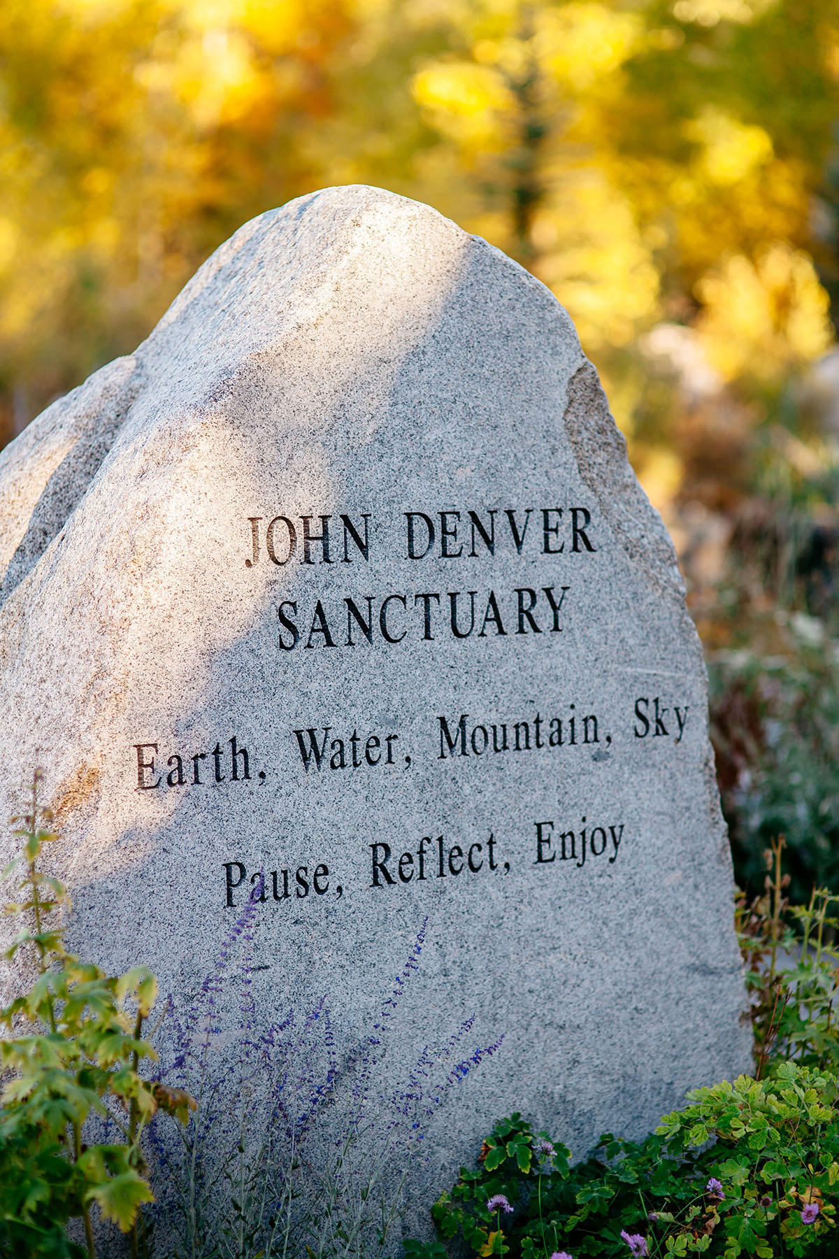 Fall mountain wedding in Aspen, Colorado John Denver Sanctuary stone rock