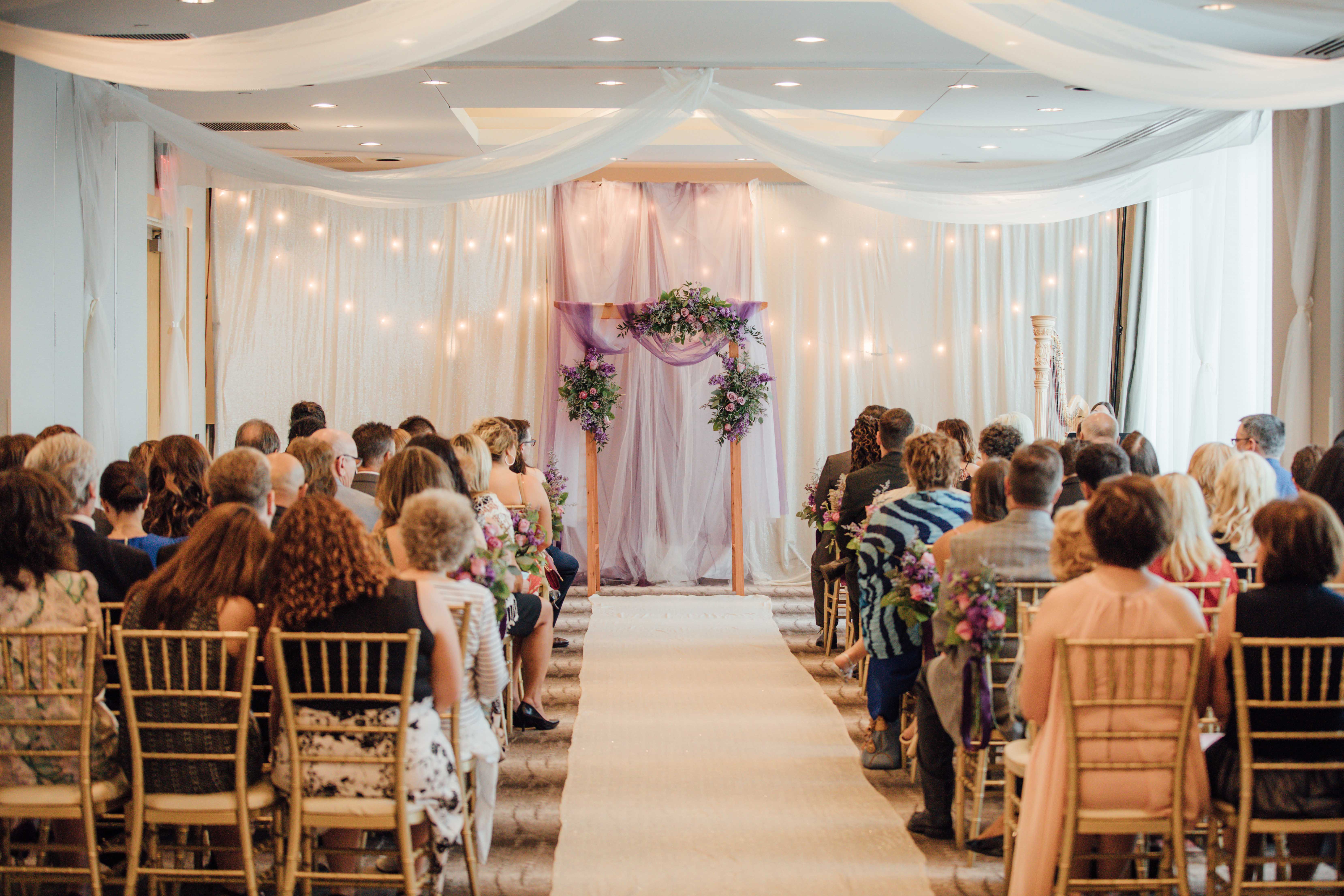 Purple summer wedding in Pittsburgh, Pennsylvania two brides long white dresses bouquets