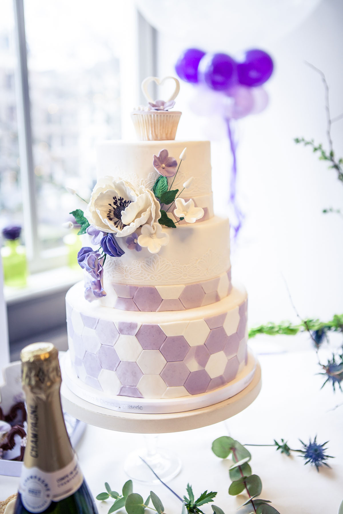 Romantic ivory and purple wedding inspiration geometric floral cake balloons
