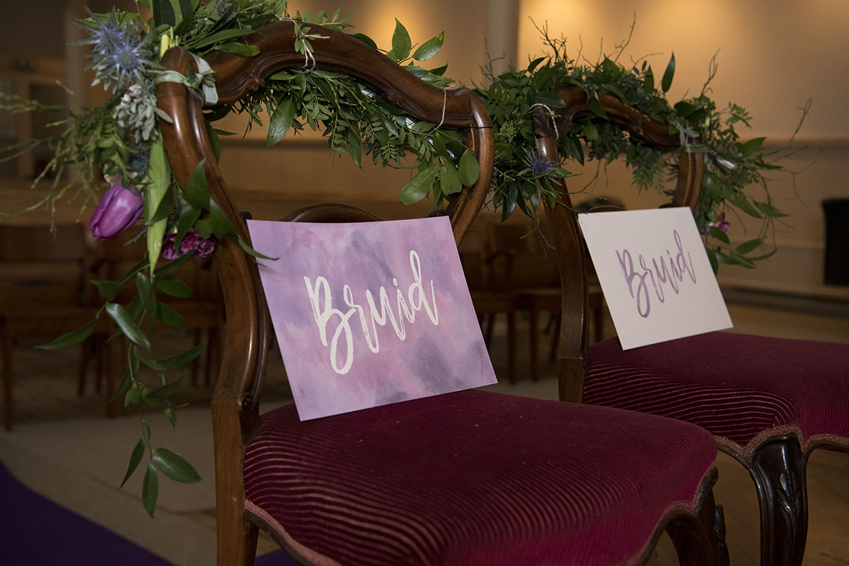 Romantic ivory and purple wedding inspiration two brides seats