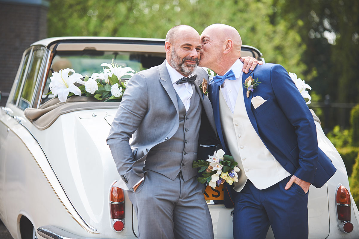 Secret garden wedding inspiration two grooms grey suit blue suit bow ties castle Netherlands