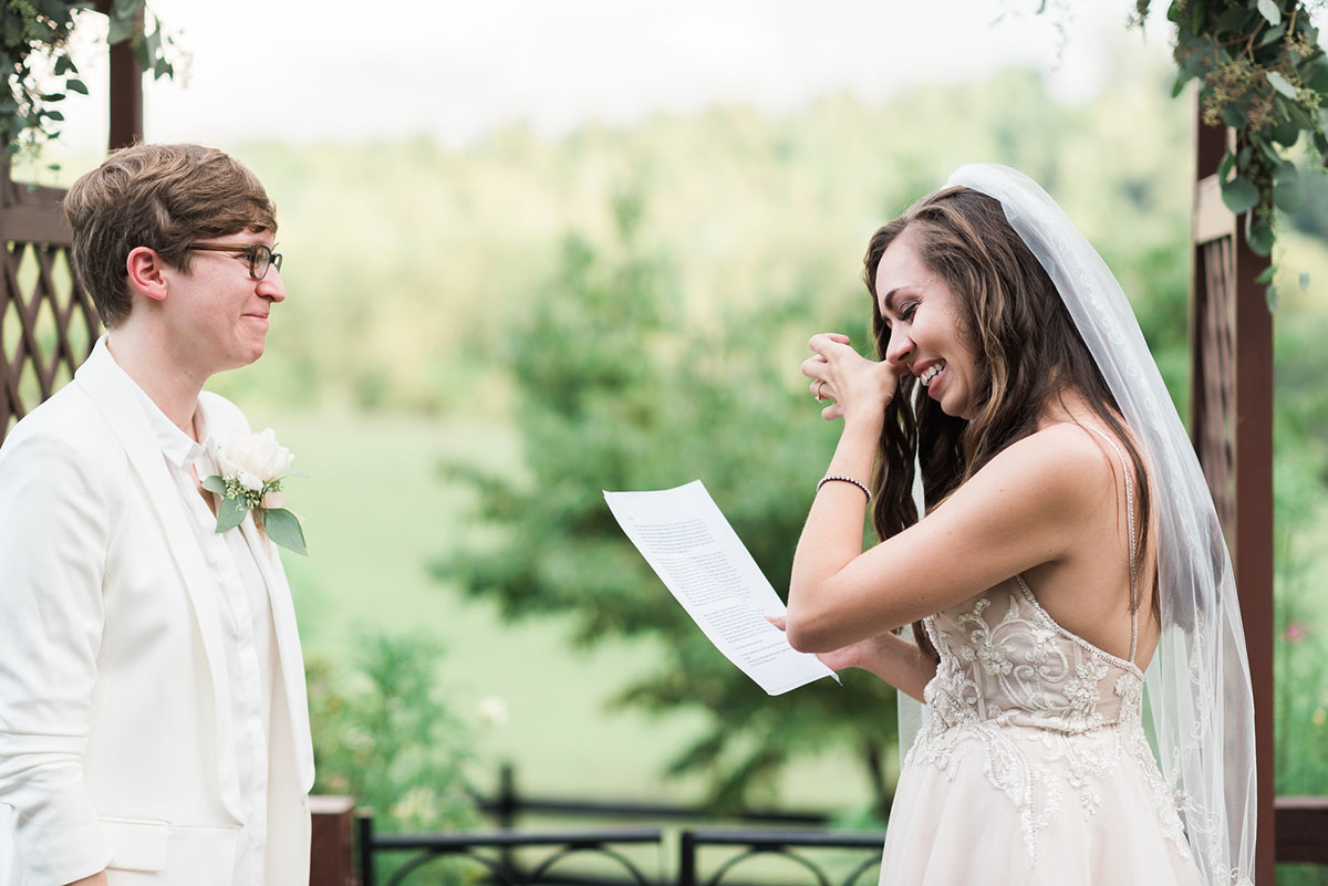 Storybrook Farm wedding in Jonesborough, Tennessee two brides blush dress all white suit vows