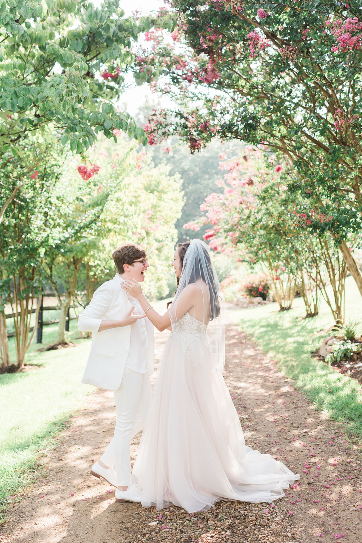 Storybrook Farm wedding in Jonesborough, Tennessee two brides blush dress all white suit first look