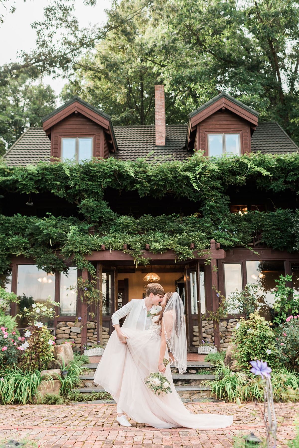 Storybrook Farm wedding in Jonesborough, Tennessee two brides blush dress all white suit estate house