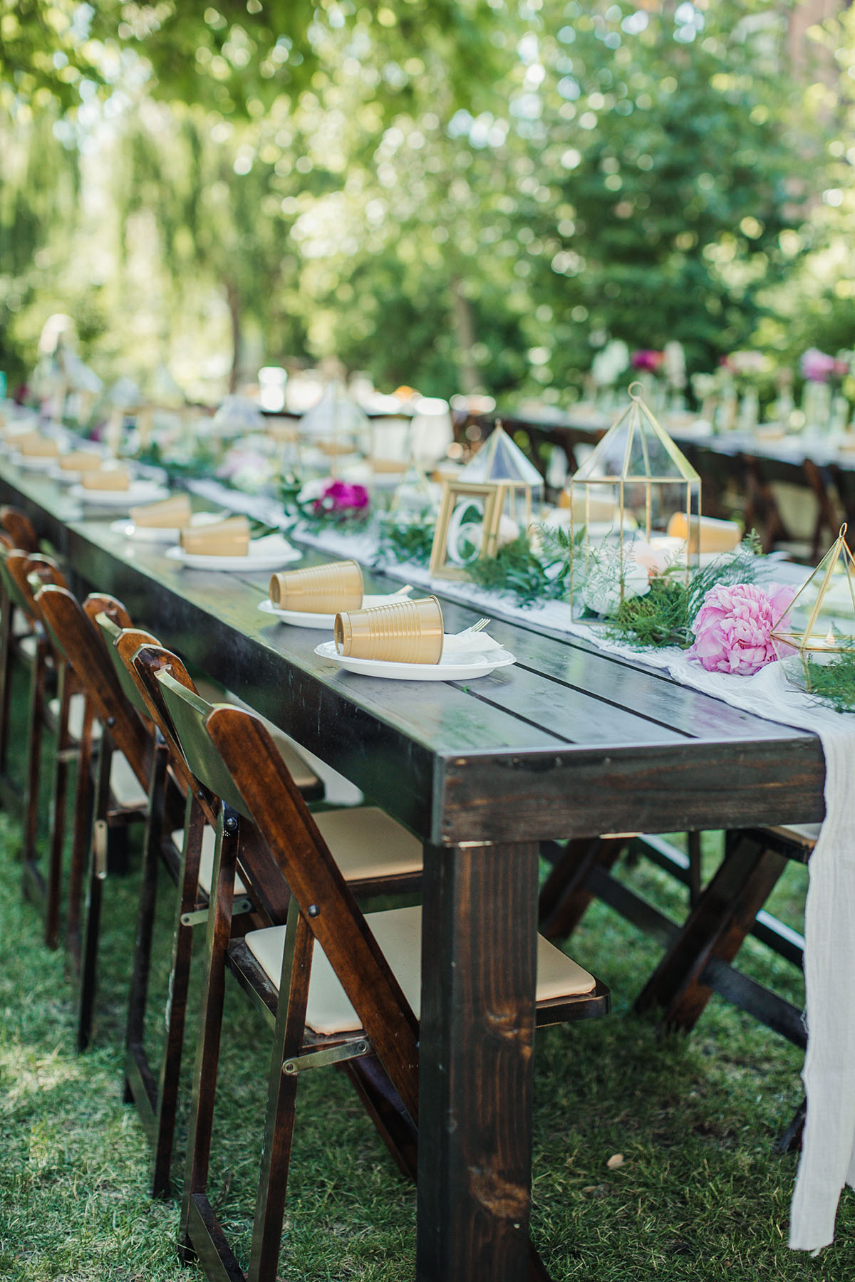 Eclectic bohemian mountain fairytale wedding table setting outside outdoors nature green