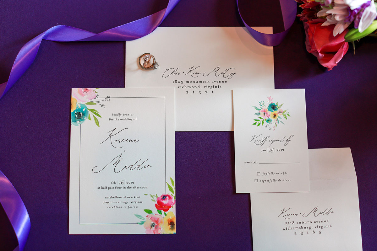Fun rainbow wedding inspiration for people who want to elope purple floral wedding invitations