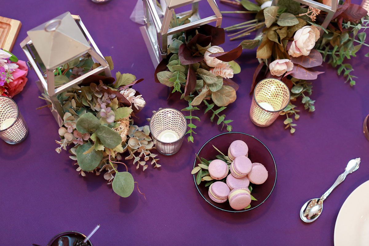 Fun rainbow wedding inspiration for people who want to elope purple tablescape plants succulents macaroons