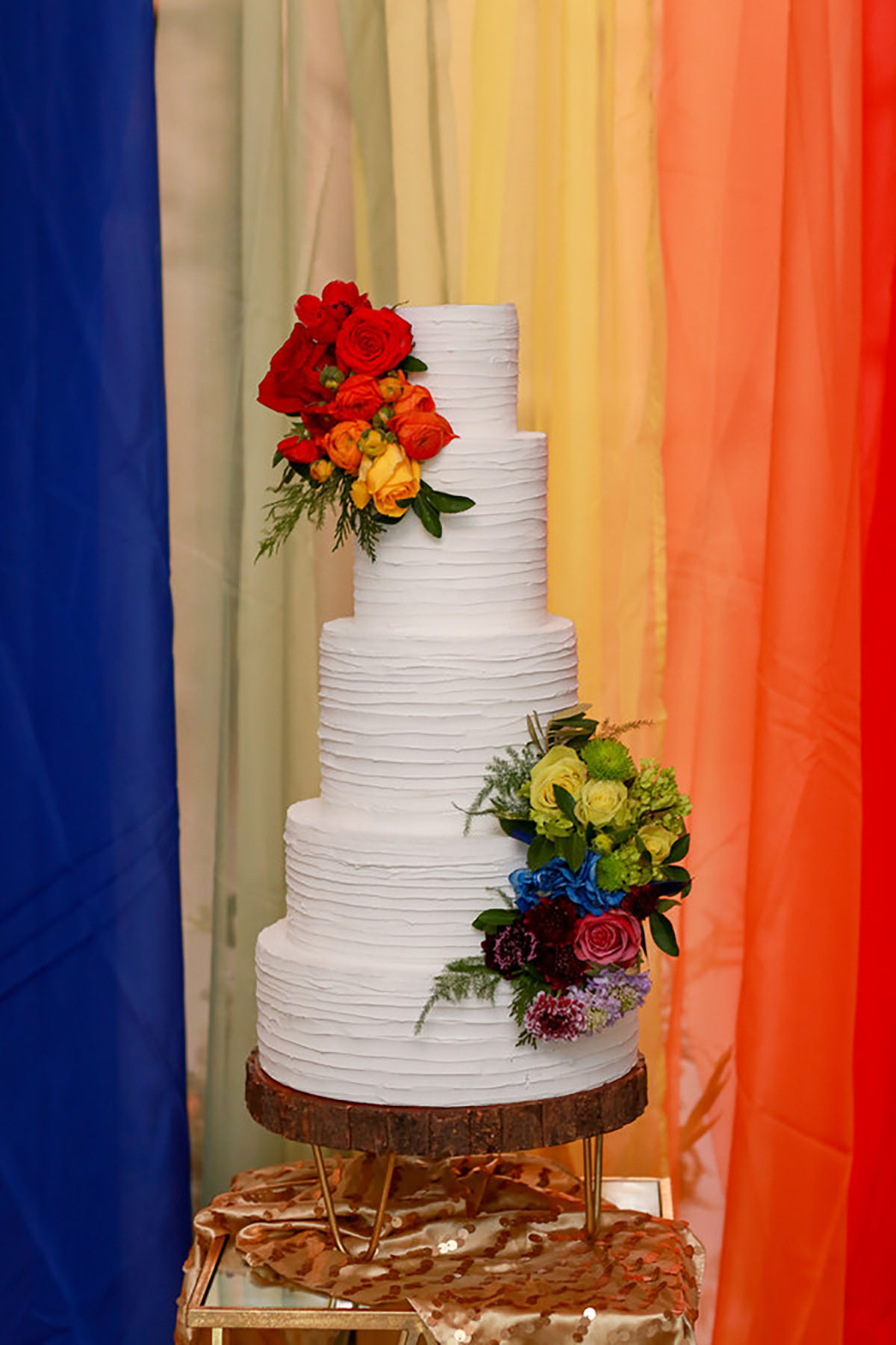 Fun rainbow wedding inspiration for people who want to elope rainbow wedding cake flowers vivid bright
