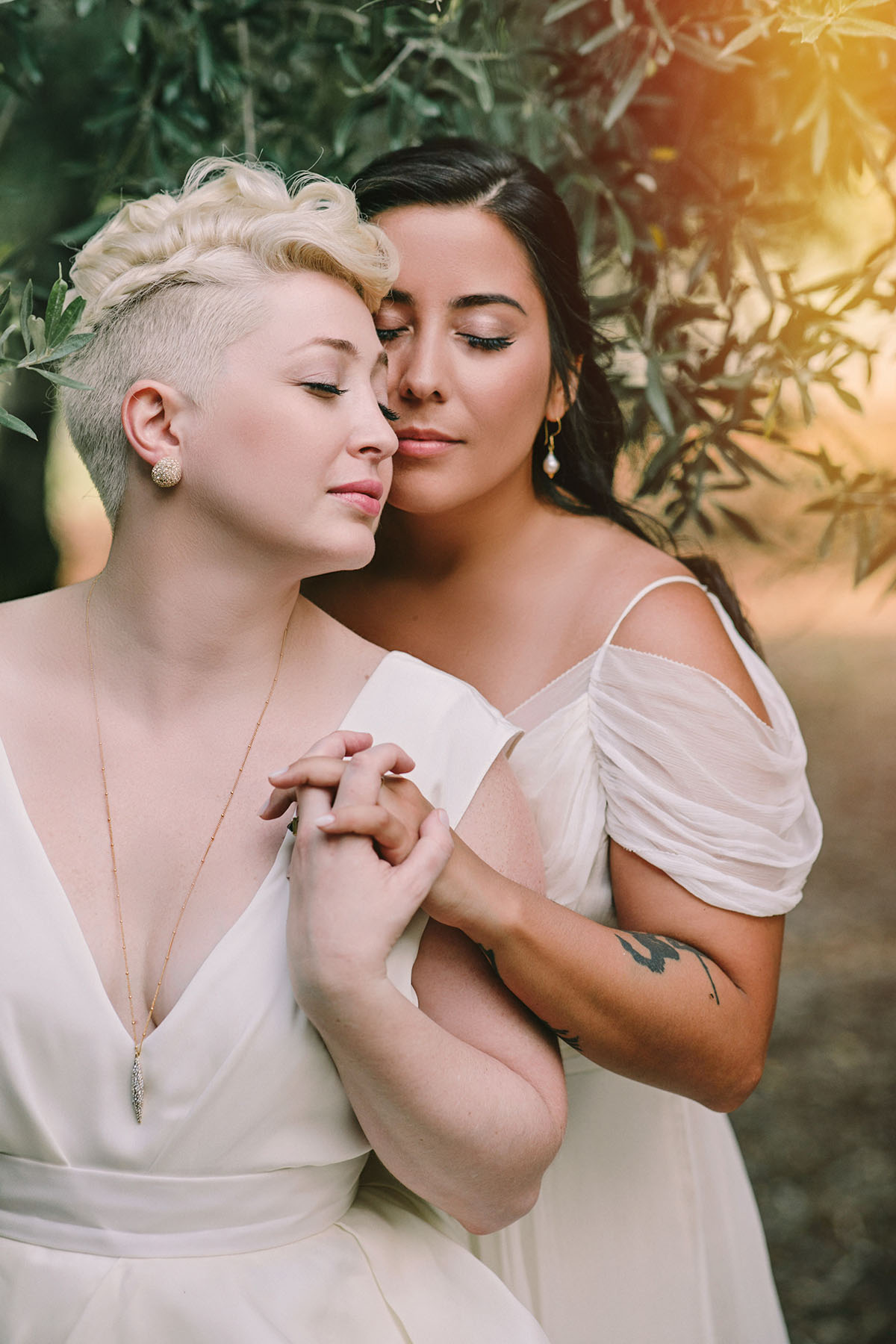 Natural beauty shines in luxury destination wedding in Crete, Greece two brides lesbian wedding nature outdoors greenery hills