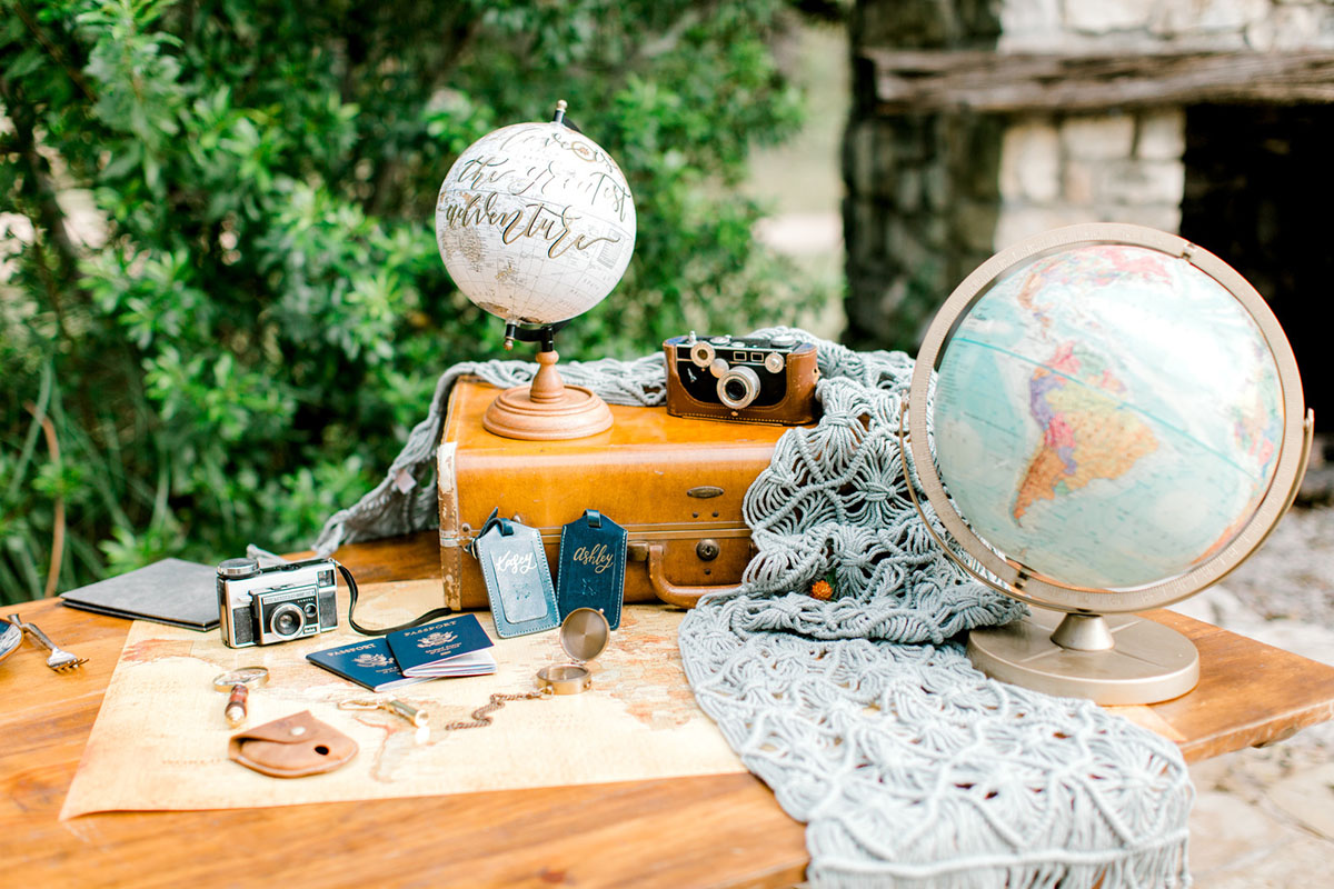 This travel-inspired hot air balloon elopement will seriously lift your heart decor globes travel luggage