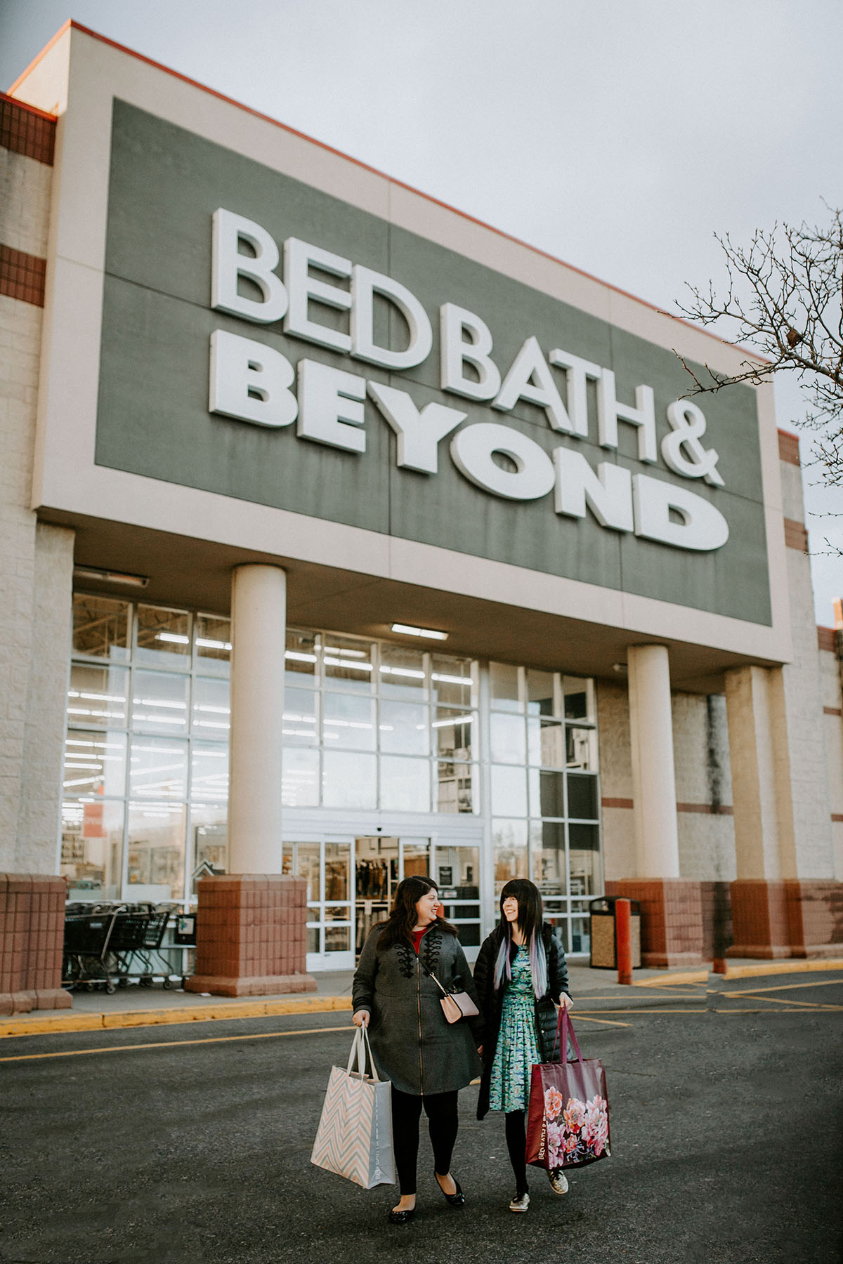 Creating our wedding registry with Bed Bath & Beyond outside Bed Bath and Beyond shopping bags store