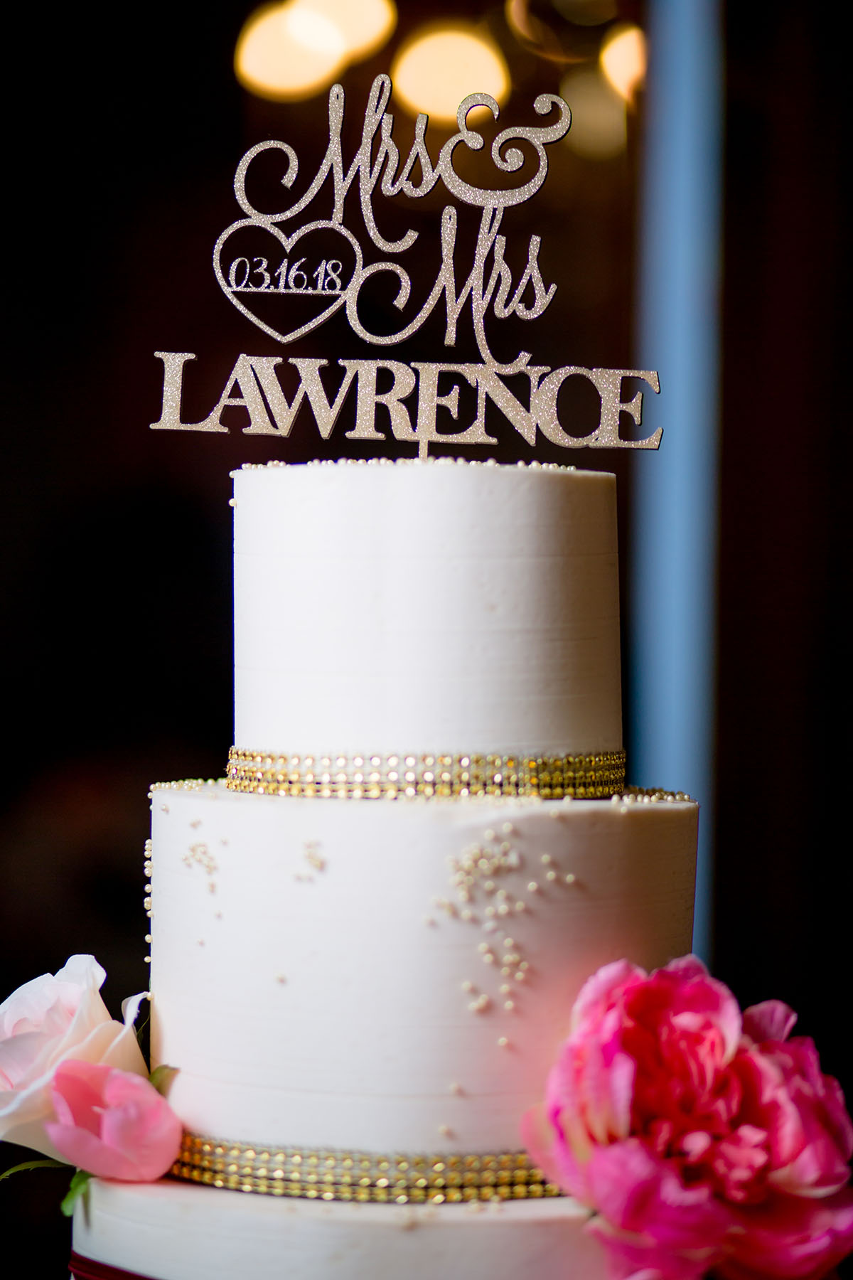 Classic purple vintage wedding in Towson, Maryland Mrs. and Mrs. Lawrence cream cake gold trim