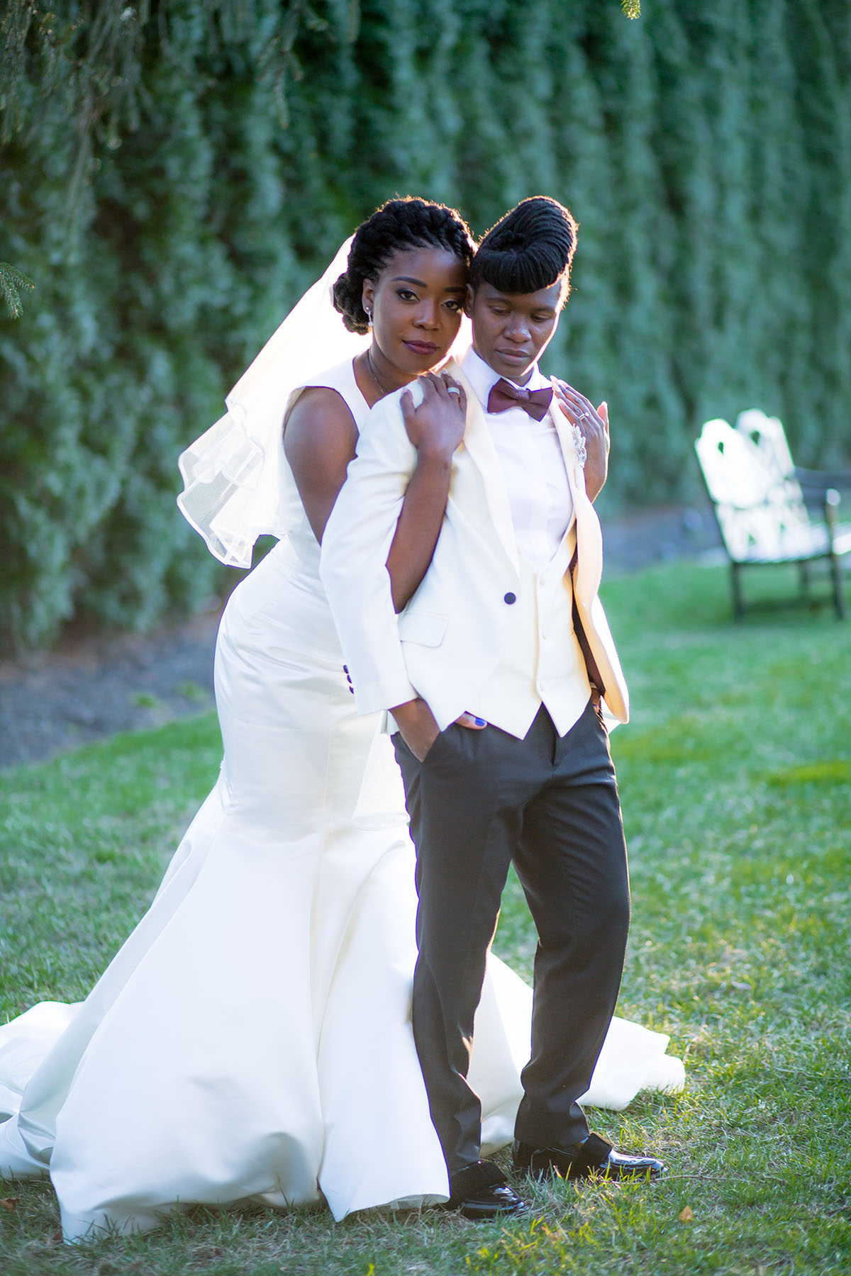 Classic purple vintage wedding in Towson, Maryland two brides white tux white dress bow tie