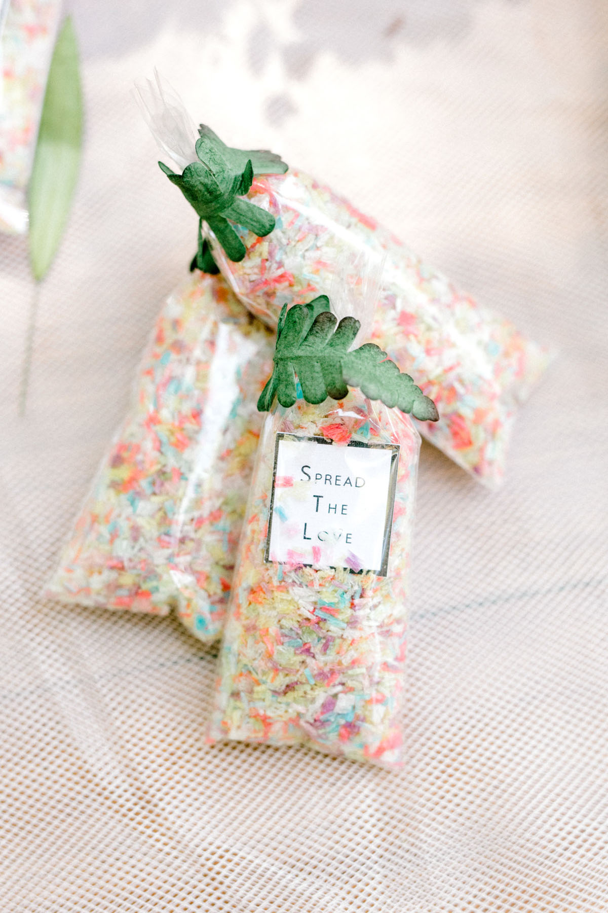 Intimate summer wedding in the woods surrounded by nature confetti