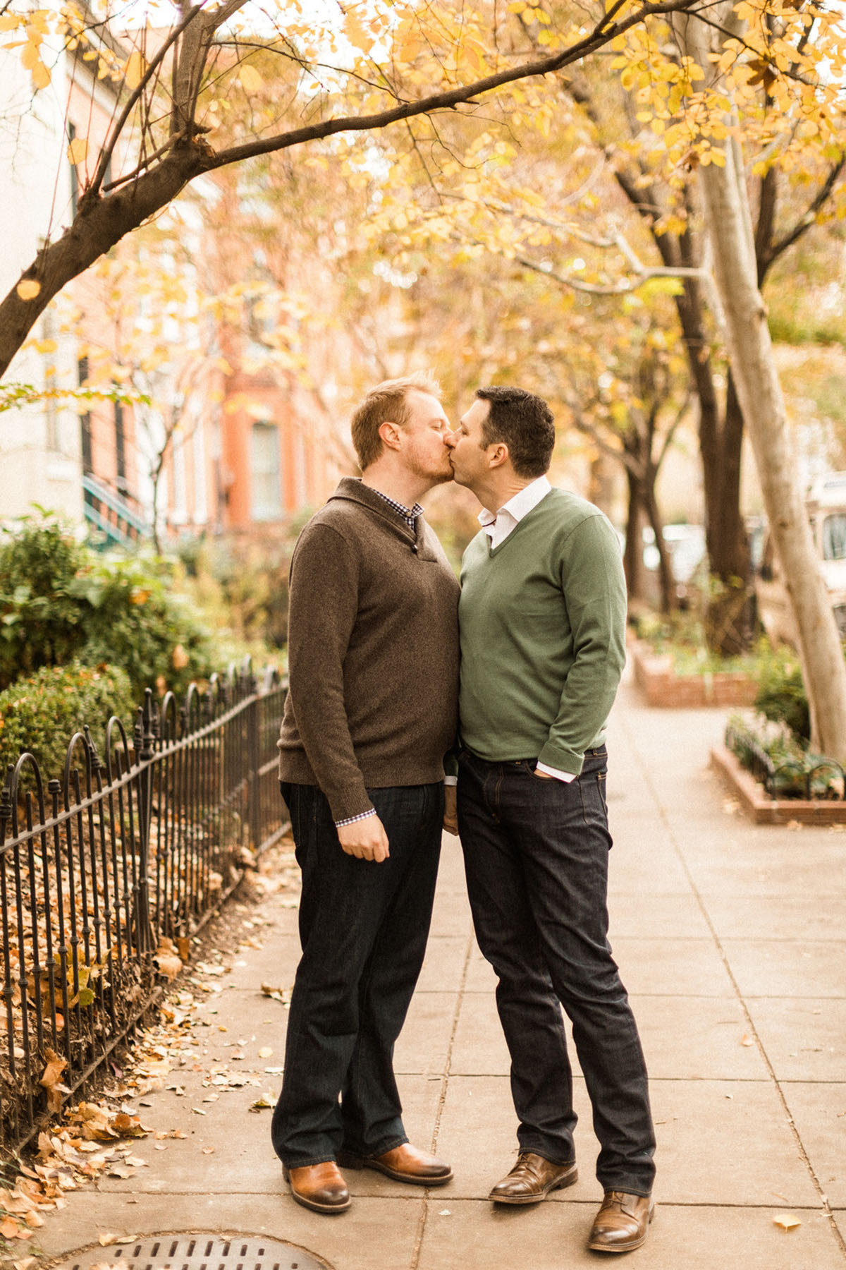 Romantic fall engagement photos in Washington, D.C. two grooms Logan Circle foliage