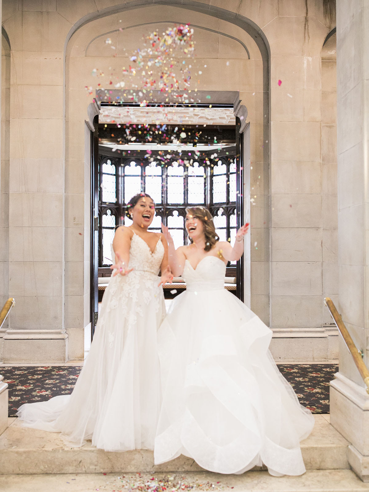This romantic spring castle wedding is fit for a princess—or two two brides white lace dresses florals crystals diamonds glitter