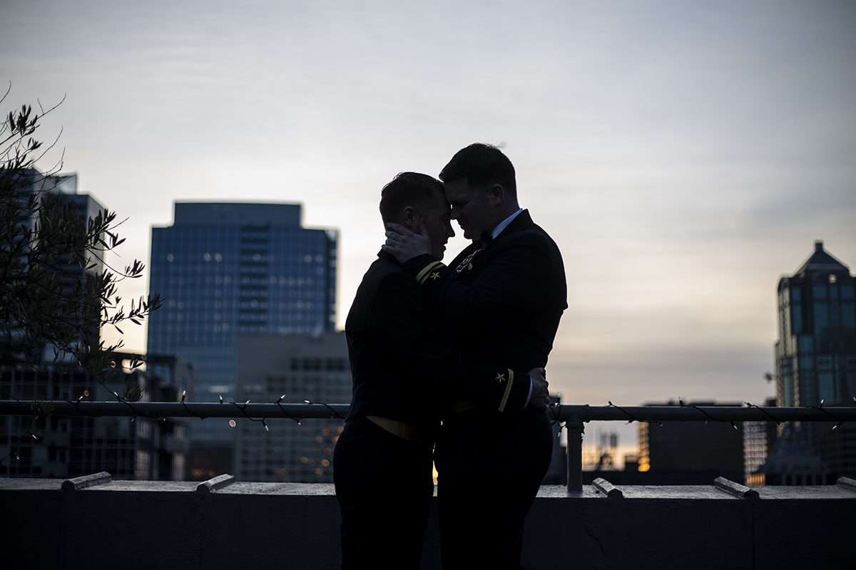Glamorous 1920s themed wedding with an epic drag reception two grooms gay military wedding Seattle sunset
