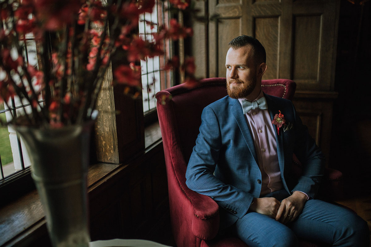 Timeless and romantic vintage library wedding inspiration two grooms blue tuxedos fall autumn colors