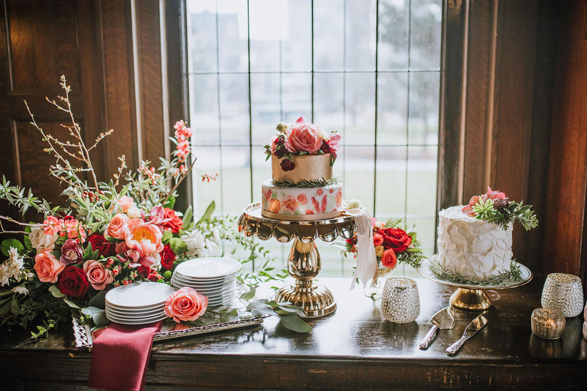 Timeless and romantic vintage library wedding inspiration two grooms blue tuxedos fall autumn colors colorful floral gold cake dessert