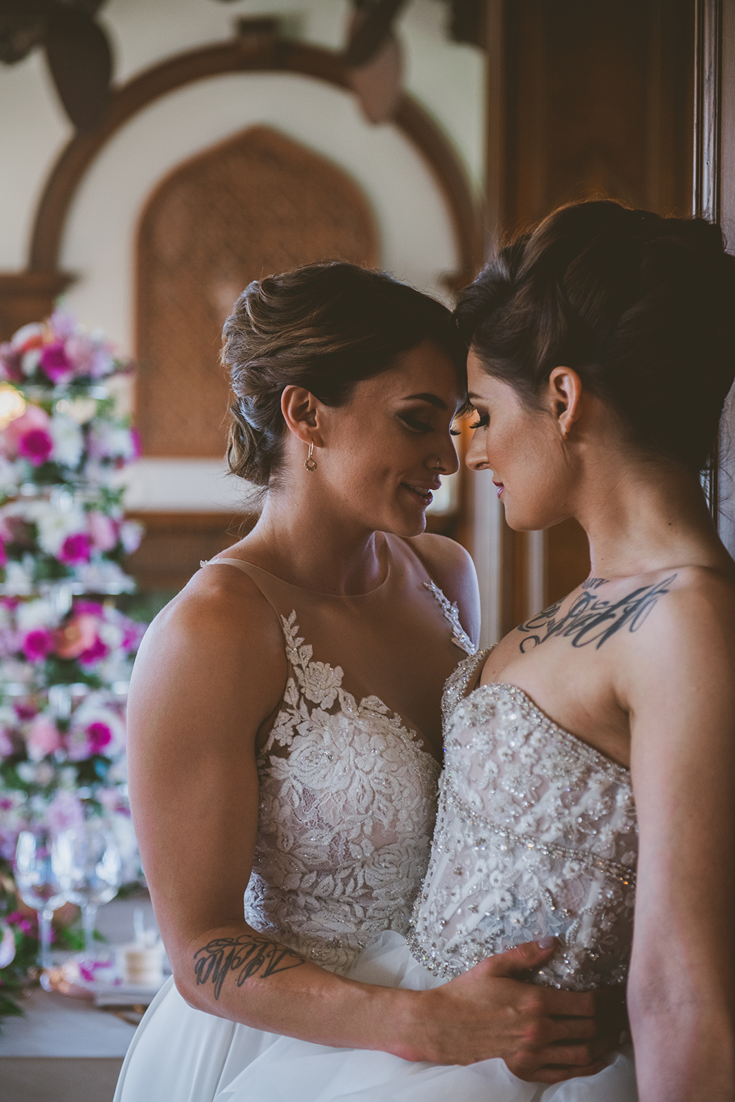 Tropical vintage wedding inspiration in Victoria, British Columbia two brides lesbian wedding tattoos tulle white wedding dress