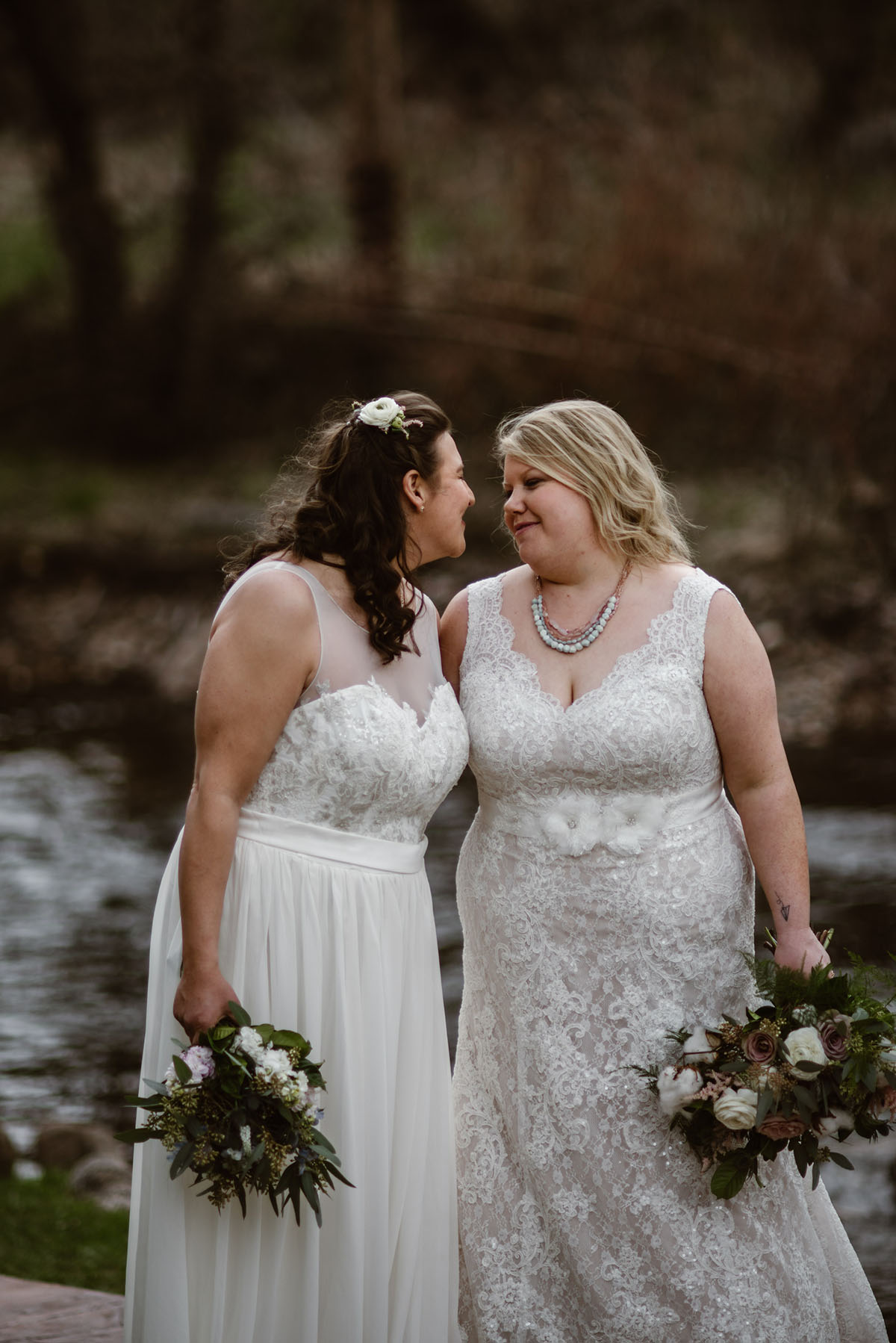 Elegant, woodsy mountain wedding in Boulder, Colorado lesbian spring wedding long white dresses
