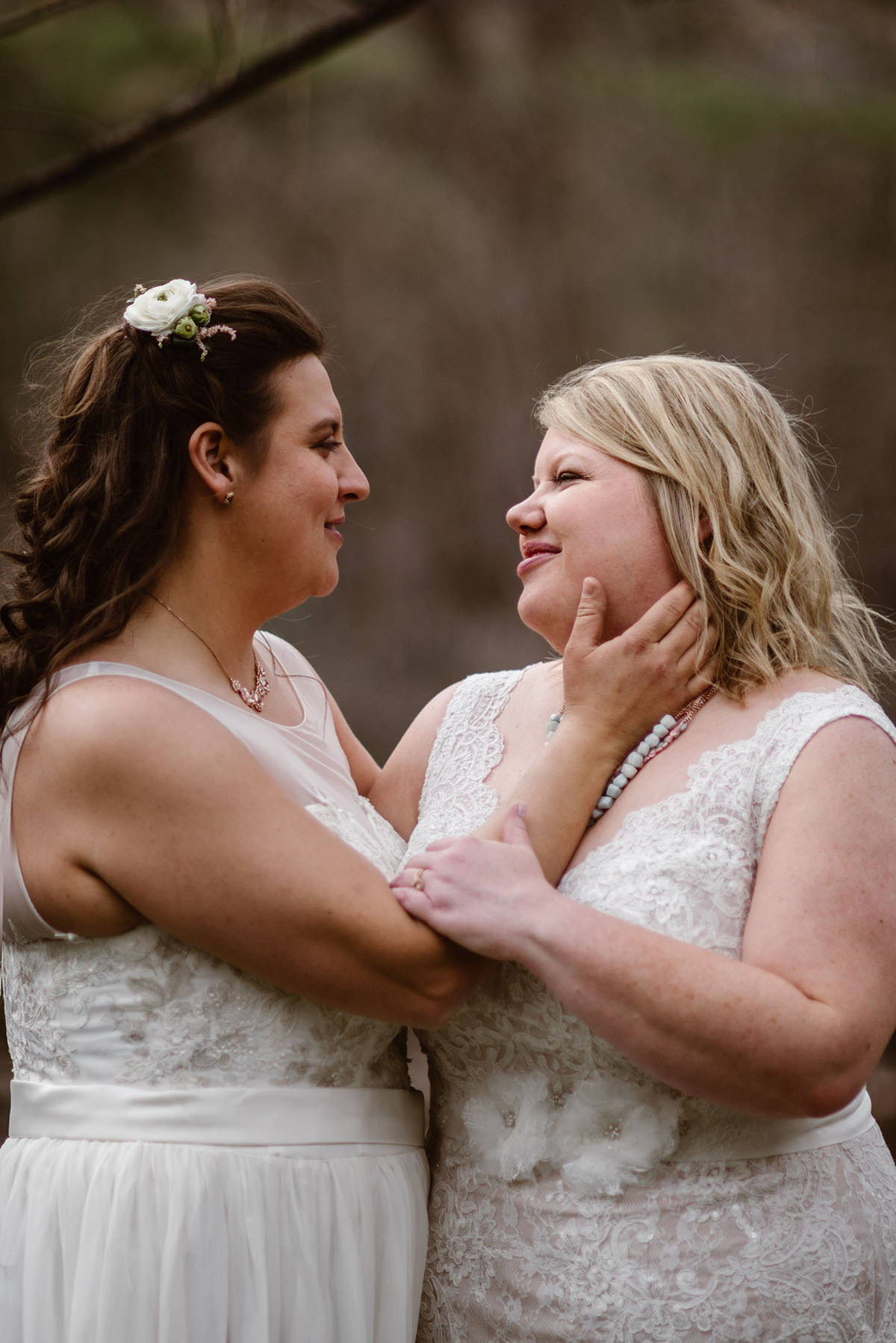 Elegant, woodsy mountain wedding in Boulder, Colorado lesbian spring wedding long white dresses