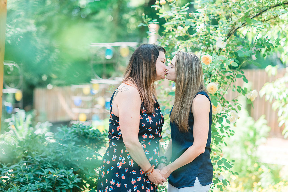 Surprise engagement at Decatur Alpaca Cottage kiss