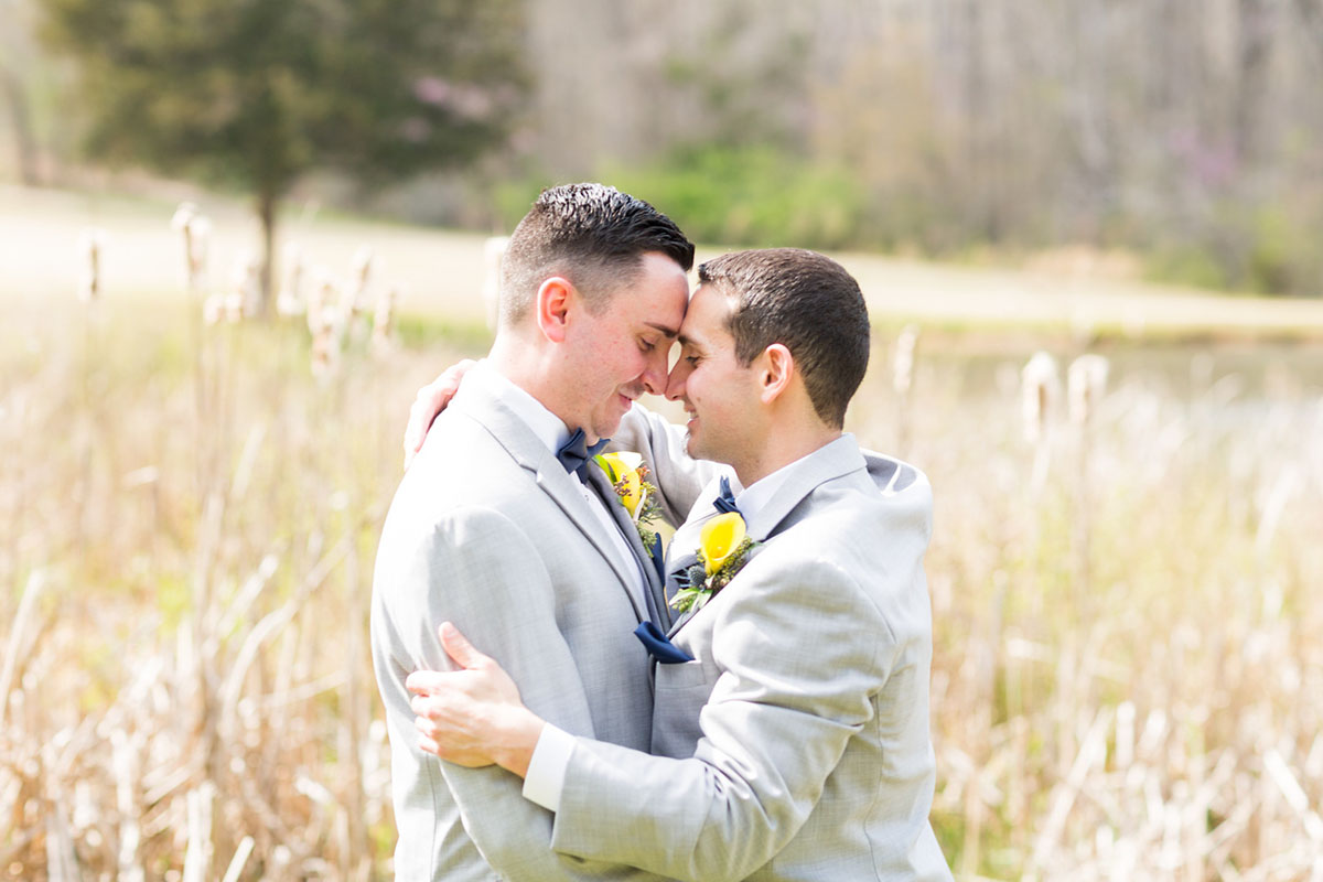 Blue and yellow spring wedding at the Lake Country Club two grooms gay wedding gray tuxes
