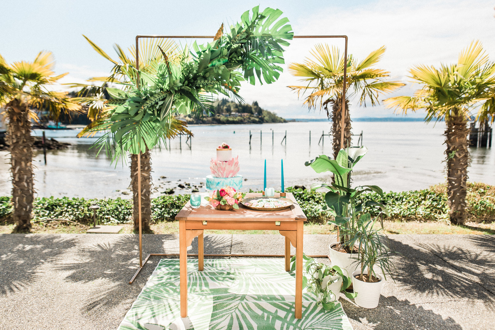 Bright, colorful Lilly Pulitzer spring wedding inspiration two brides palm tree leaves flamingos colorful waterfront