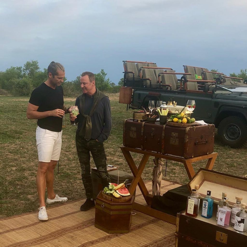 Danny Peuscovich and Colin Cowie on their private safari picnic before the proposal