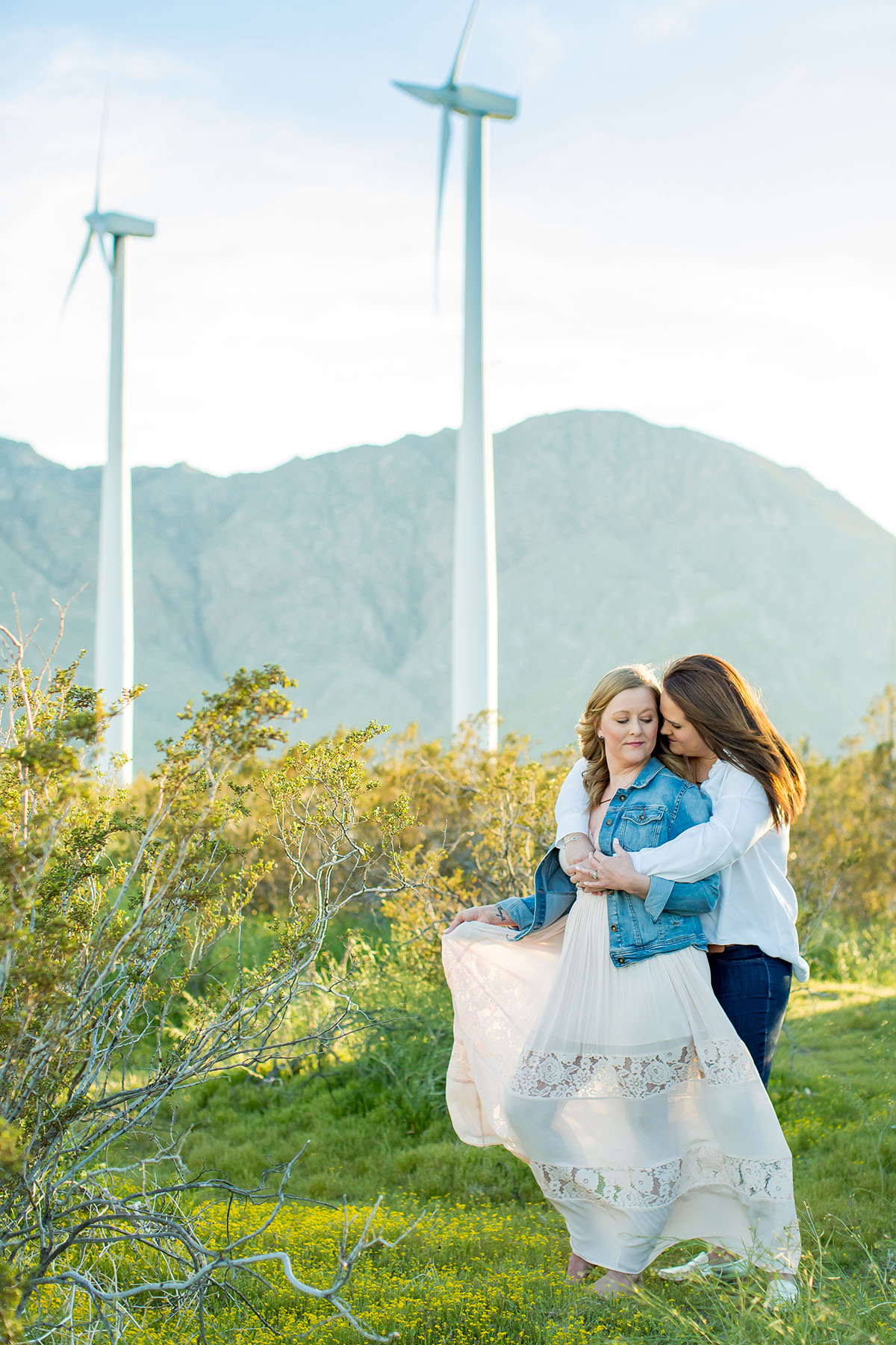 Sunset engagement photos in Palm Springs, California two brides engagement outdoors romantic