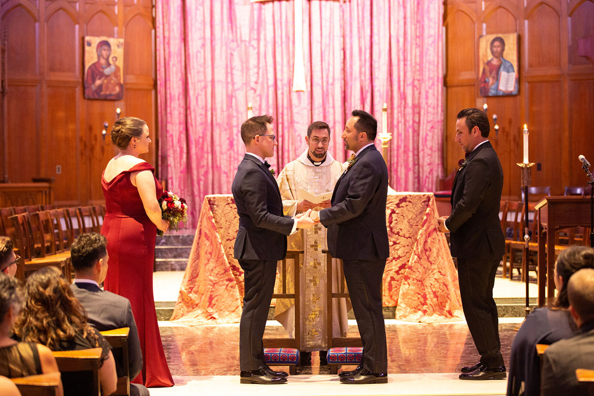 Elegant cathedral wedding in San Francisco, California two grooms black tuxedos vows