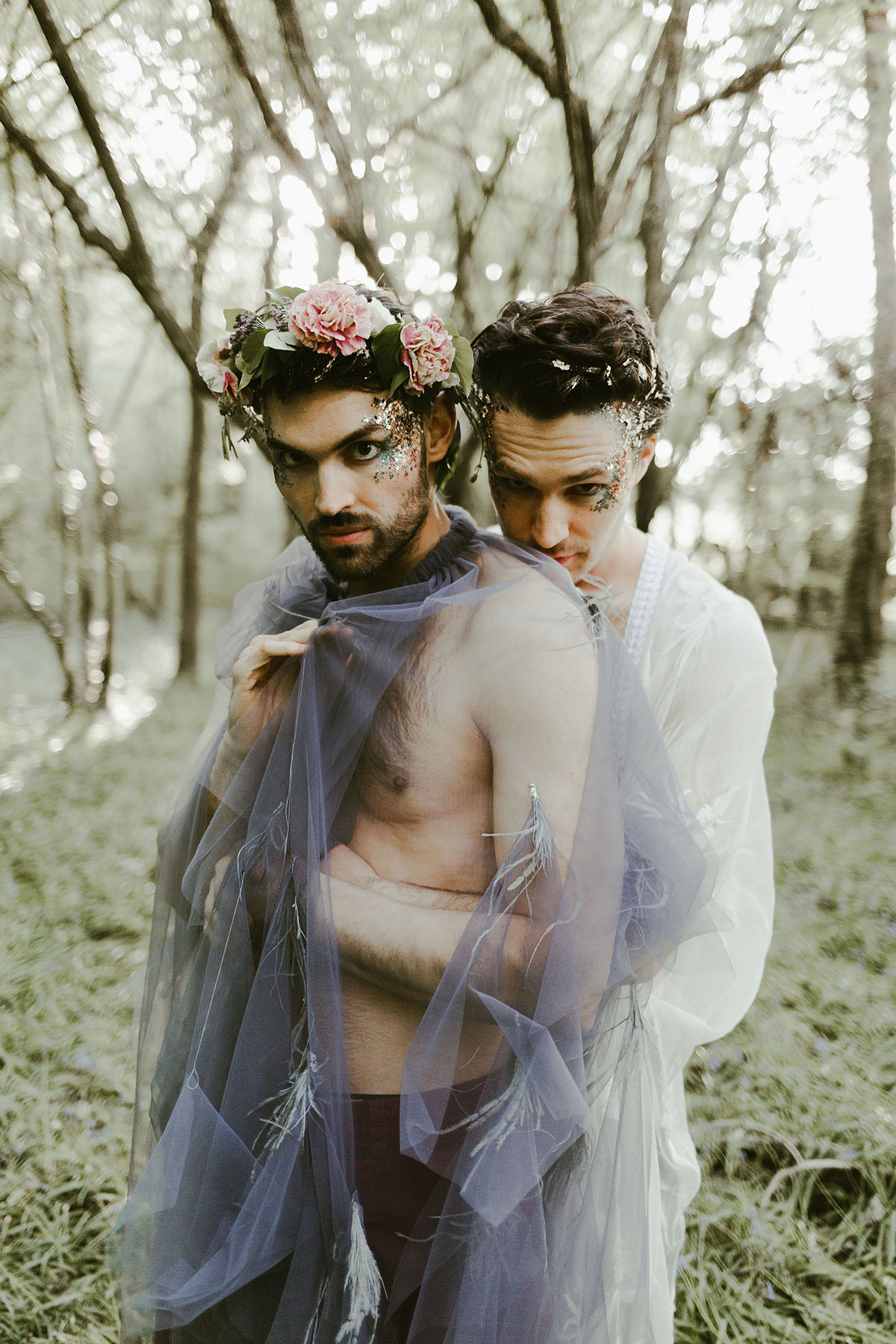 Creative wildflower elopement inspiration in the woods two grooms flowers floral veil suits creative unique styled shoot