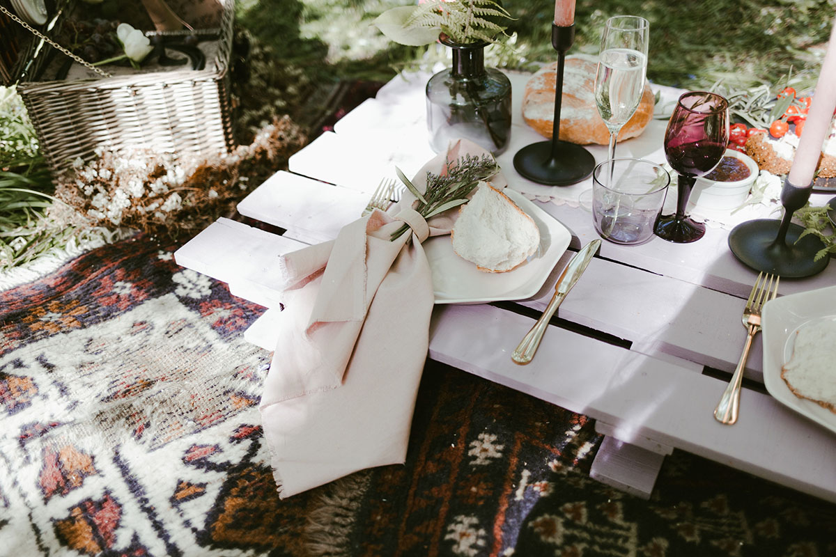 Creative wildflower elopement inspiration in the woods two grooms flowers floral veil suits creative unique styled shoot table decor