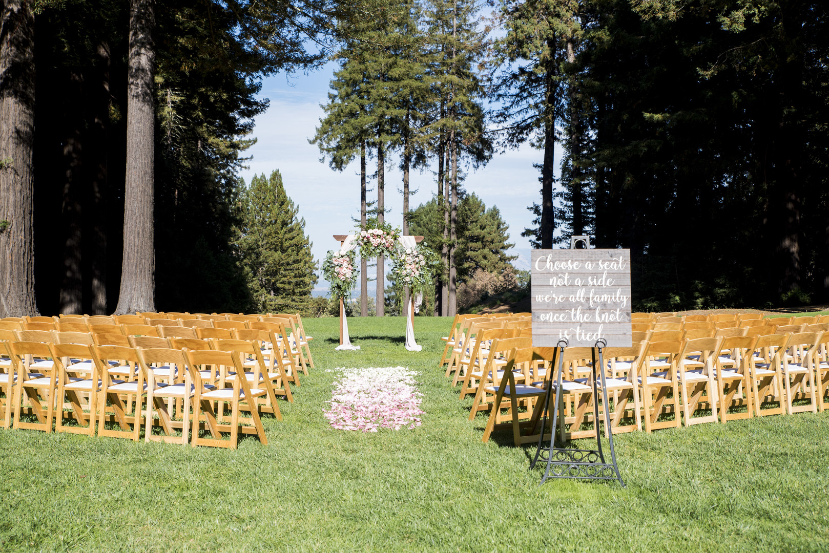 Garden wedding at the Mountain Terrace in Woodside, California two brides white dress tuxedo altar