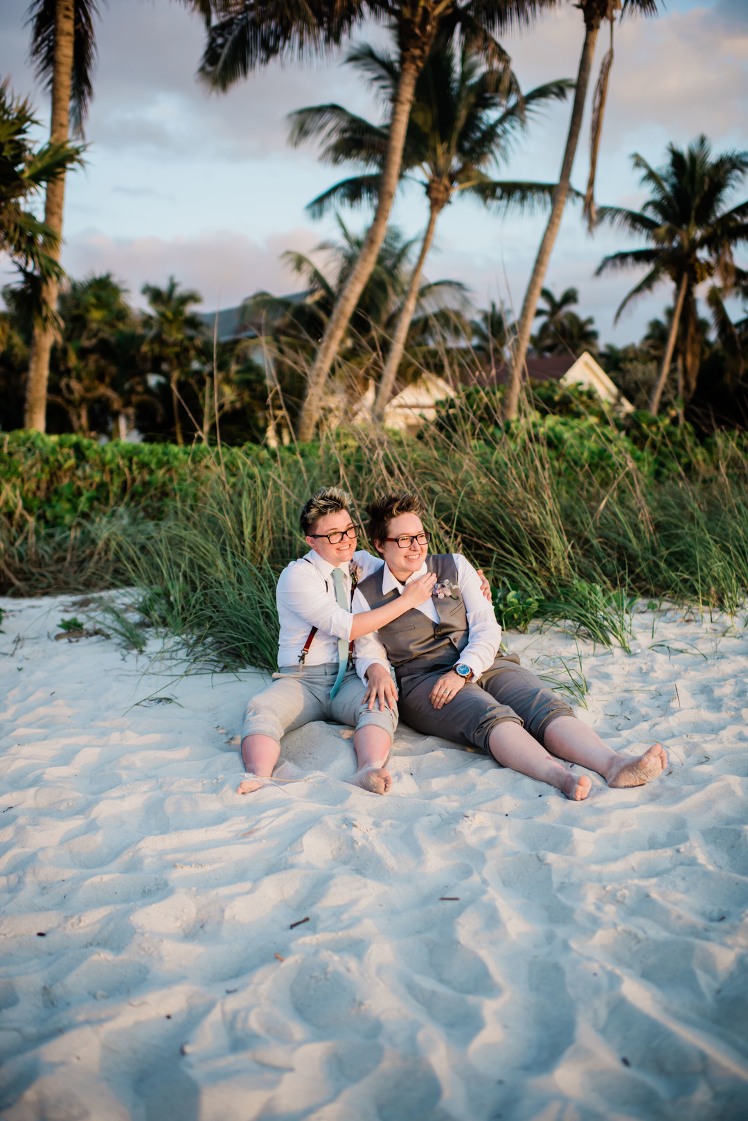 Intimate spring beach elopement in Naples, Florida small lesbian two brides casual romantic sunset