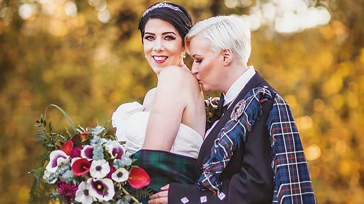 Northern Ireland politician reverses stance on same-sex marriage after daughter marries woman photo
