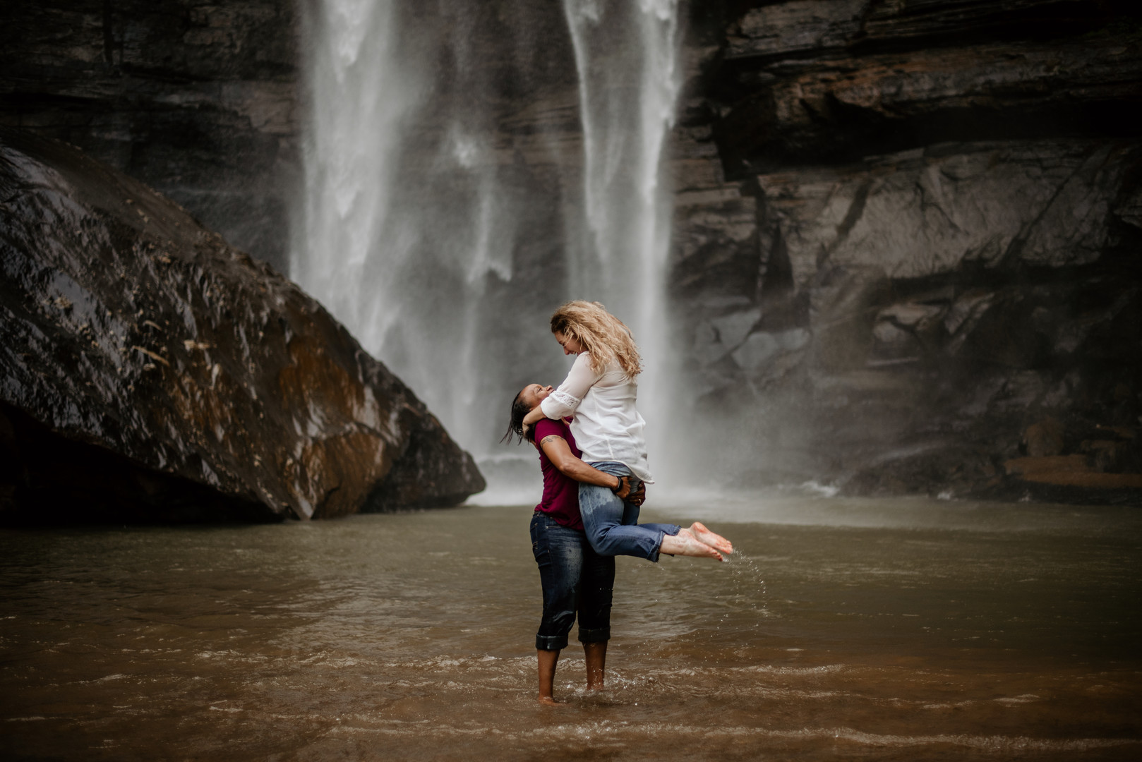 Waterfall adventure engagement photos at Toccoa Falls two brides fun lift