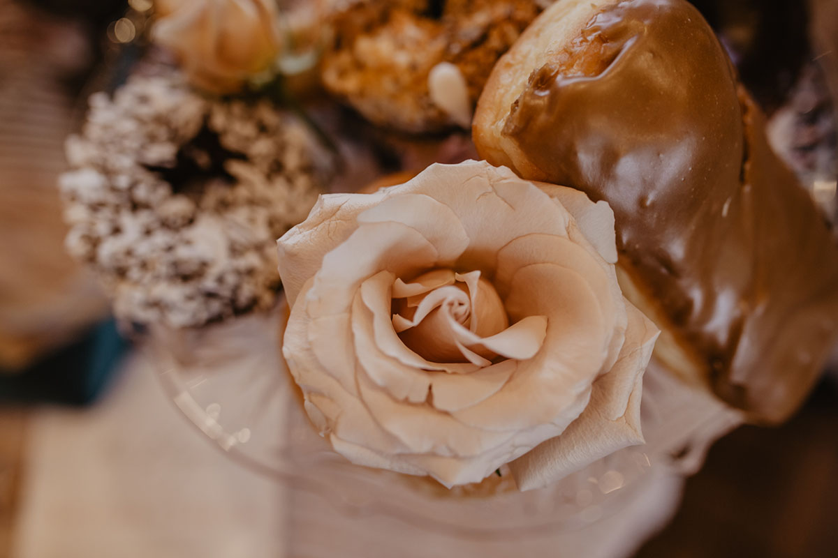 Bohemian hipster elopement inspiration at Voodoo Doughnut LGBTQ+ weddings two grooms rose gold pink cream teal Portland Oregon