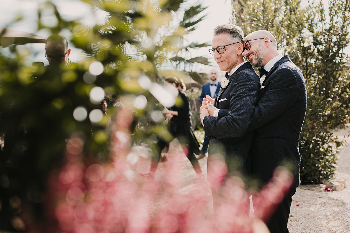 Elegant, romantic intimate wedding in Murcia, Spain LGBTQ+ weddings gay wedding two grooms black tie tuxedos roses flowers blush