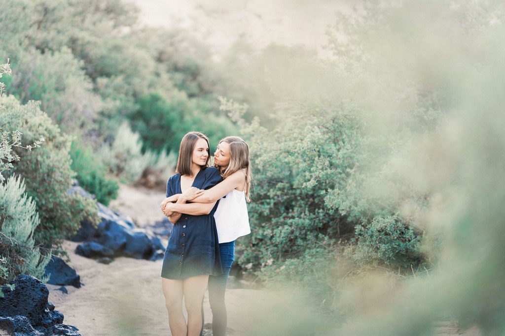 Engagement Photos On Red Rock Sandstone Cliffs Of Snow Canyon