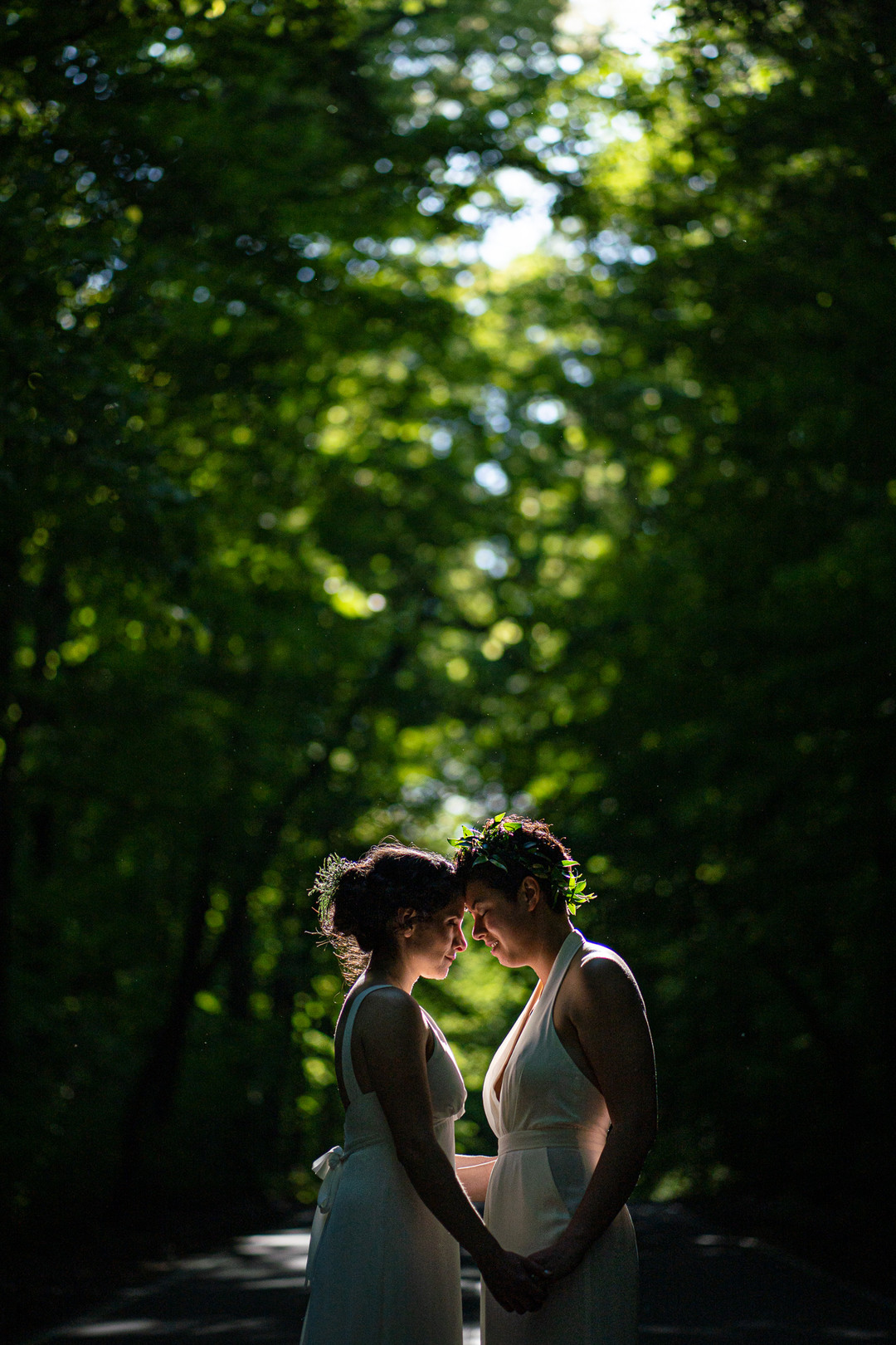 Modern green spring Midwest wedding two brides lesbian same-sex wedding jumpsuit long dress