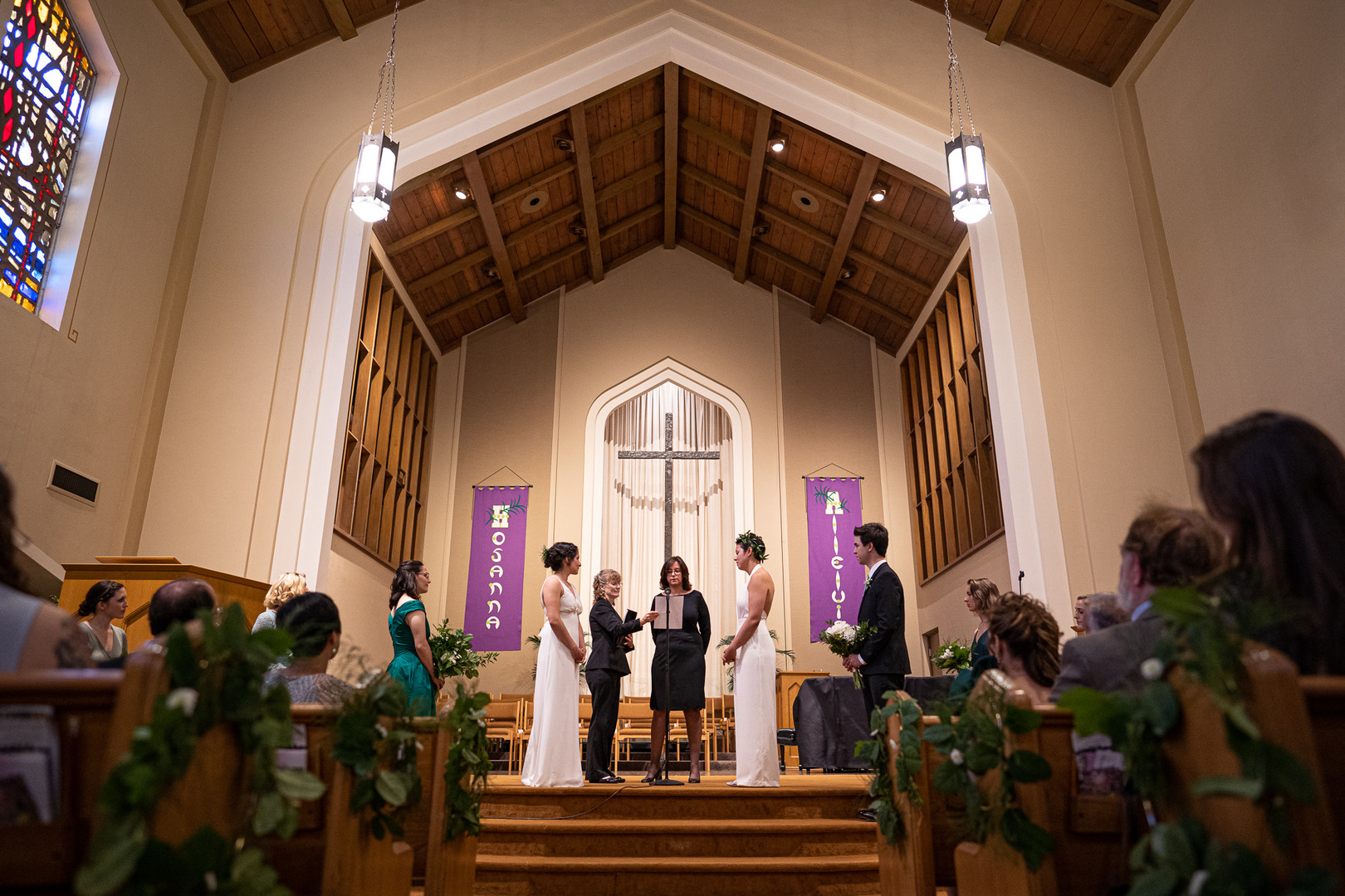 Modern green spring Midwest wedding two brides lesbian same-sex wedding jumpsuit long dress vows