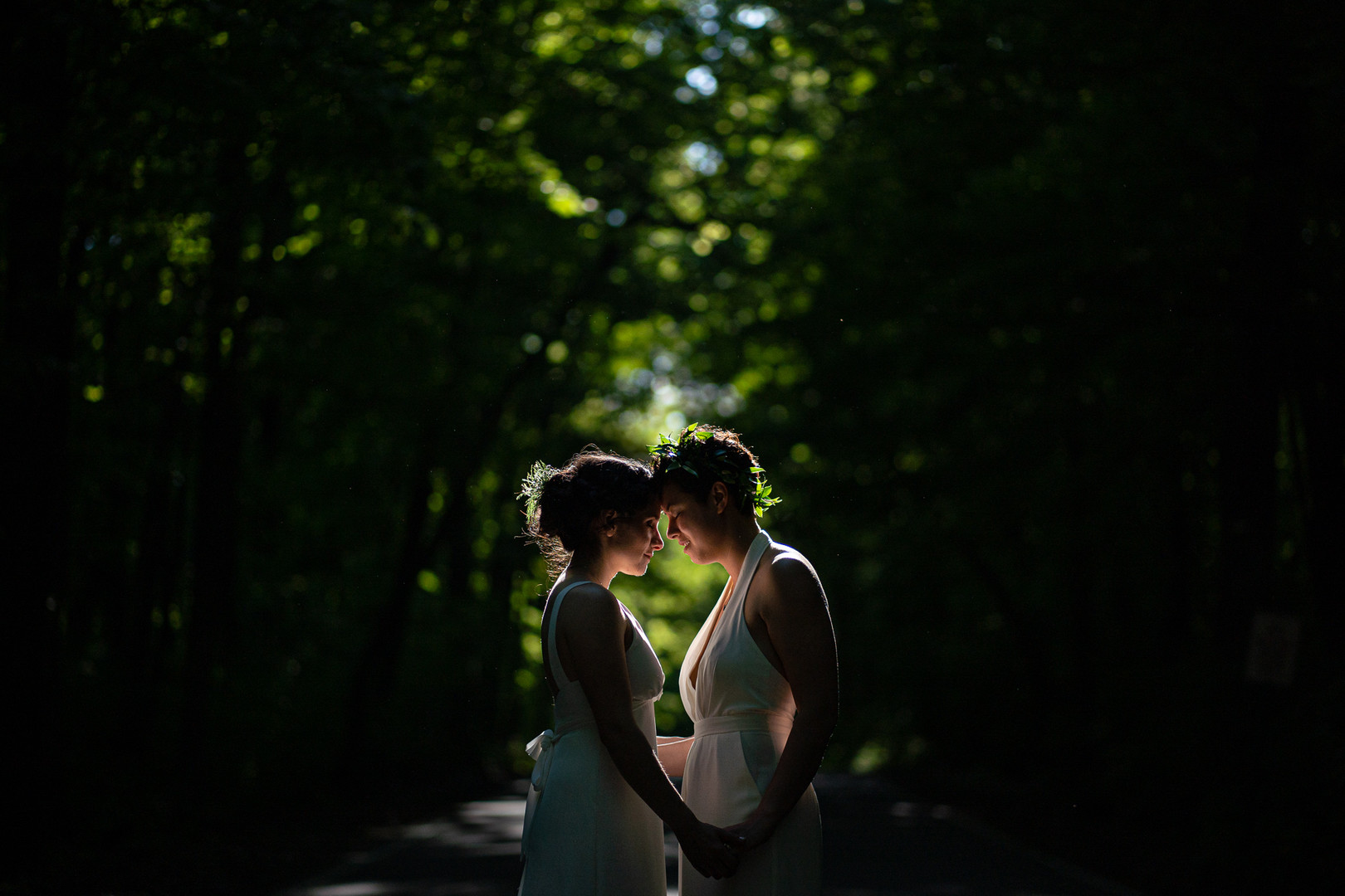 Modern green spring Midwest wedding two brides lesbian same-sex wedding jumpsuit long dress