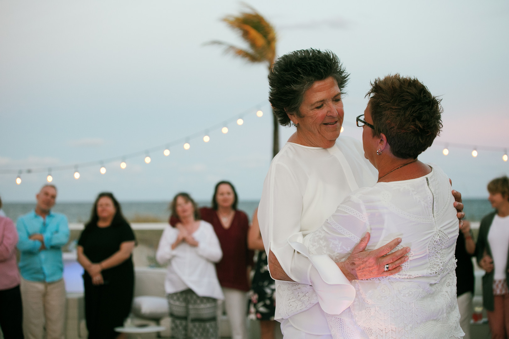 Romantic beach wedding in Fort Lauderdale, Florida two brides lesbian wedding dancing dance