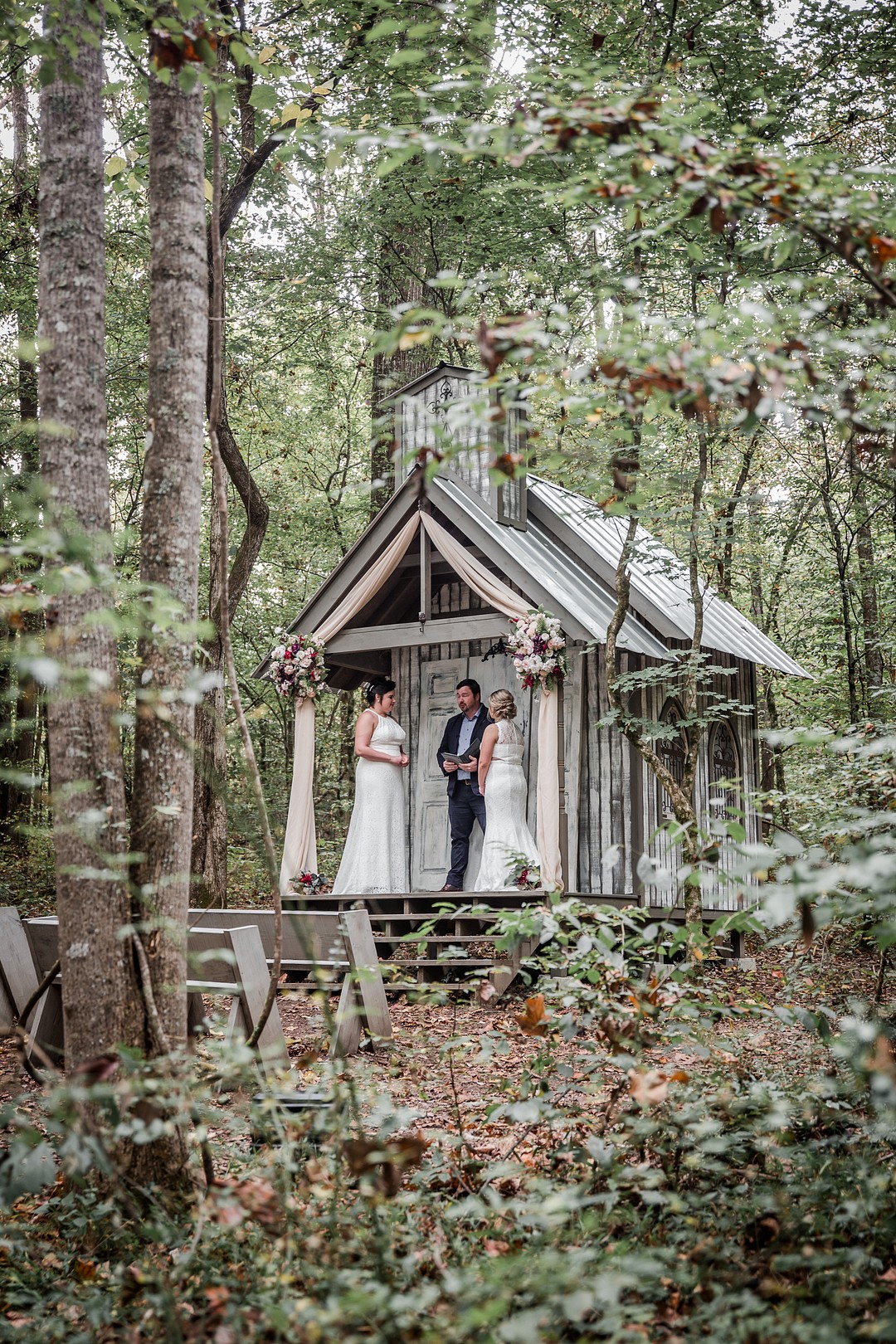 Woodland adventure elopement at Chapel in the Hollow LGBTQ+ weddings two brides waterfall mountains forest woods Tennessee hiking trails vows