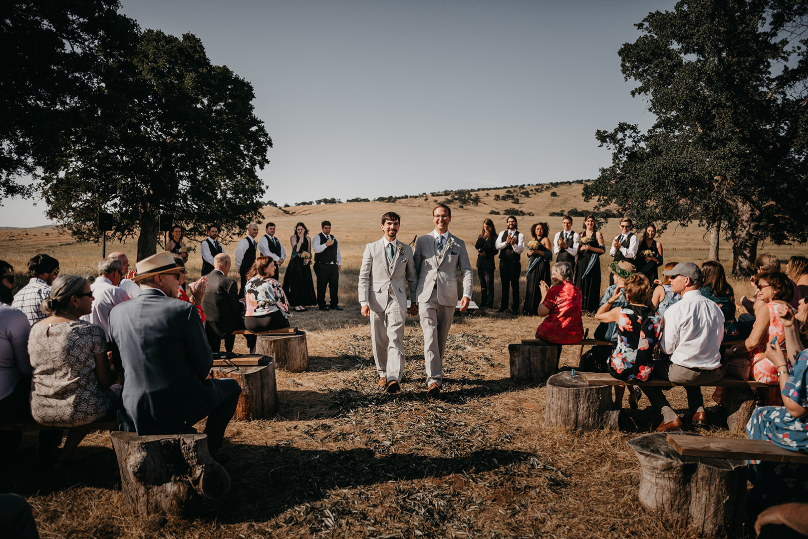 Rustic countryside spring wedding at California Woods Nature Preserve LGBTQ+ weddings gay wedding two grooms moody photojournalist nature ceremony